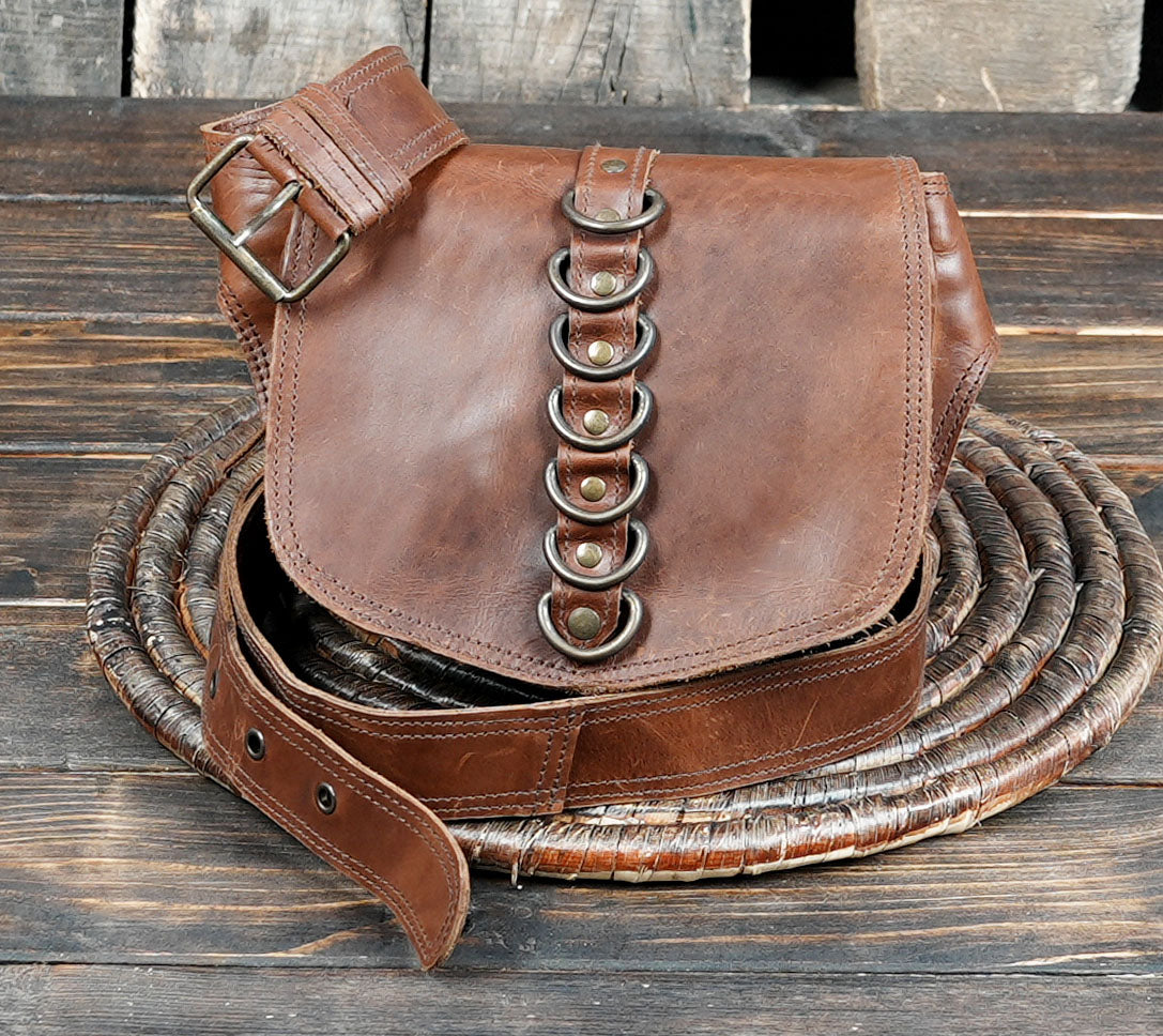 Brown leather utility waist belt with durable stitching