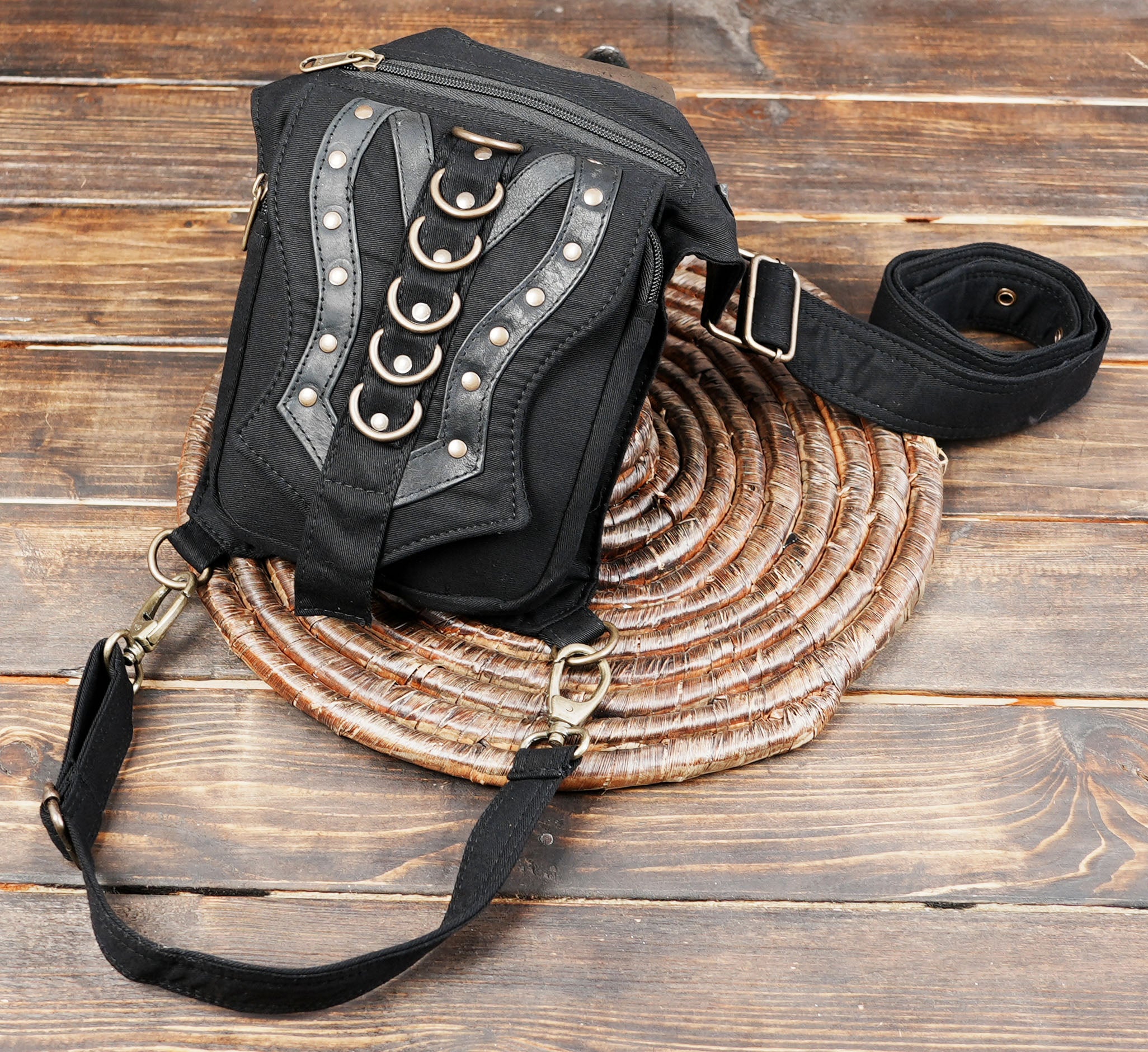 Bohemian festival waist belt bag with secure detachable leg strap and ring details.