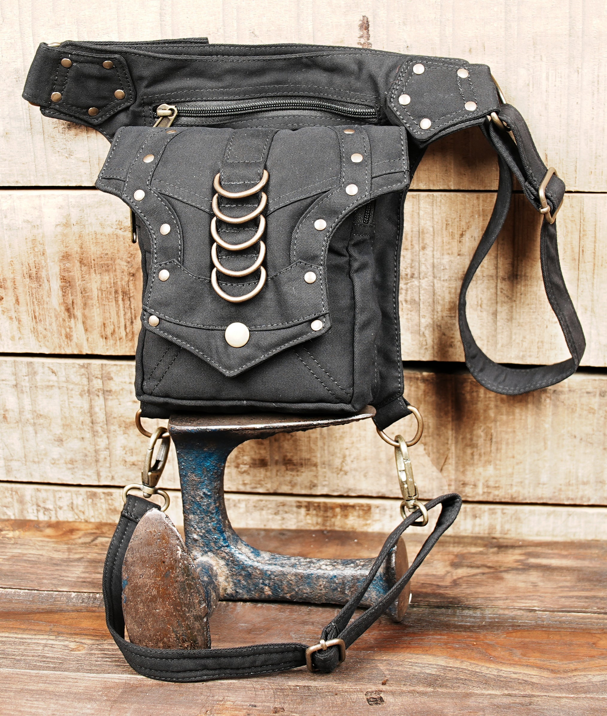 Bohemian festival waist belt bag with secure detachable leg strap and metal ring details.