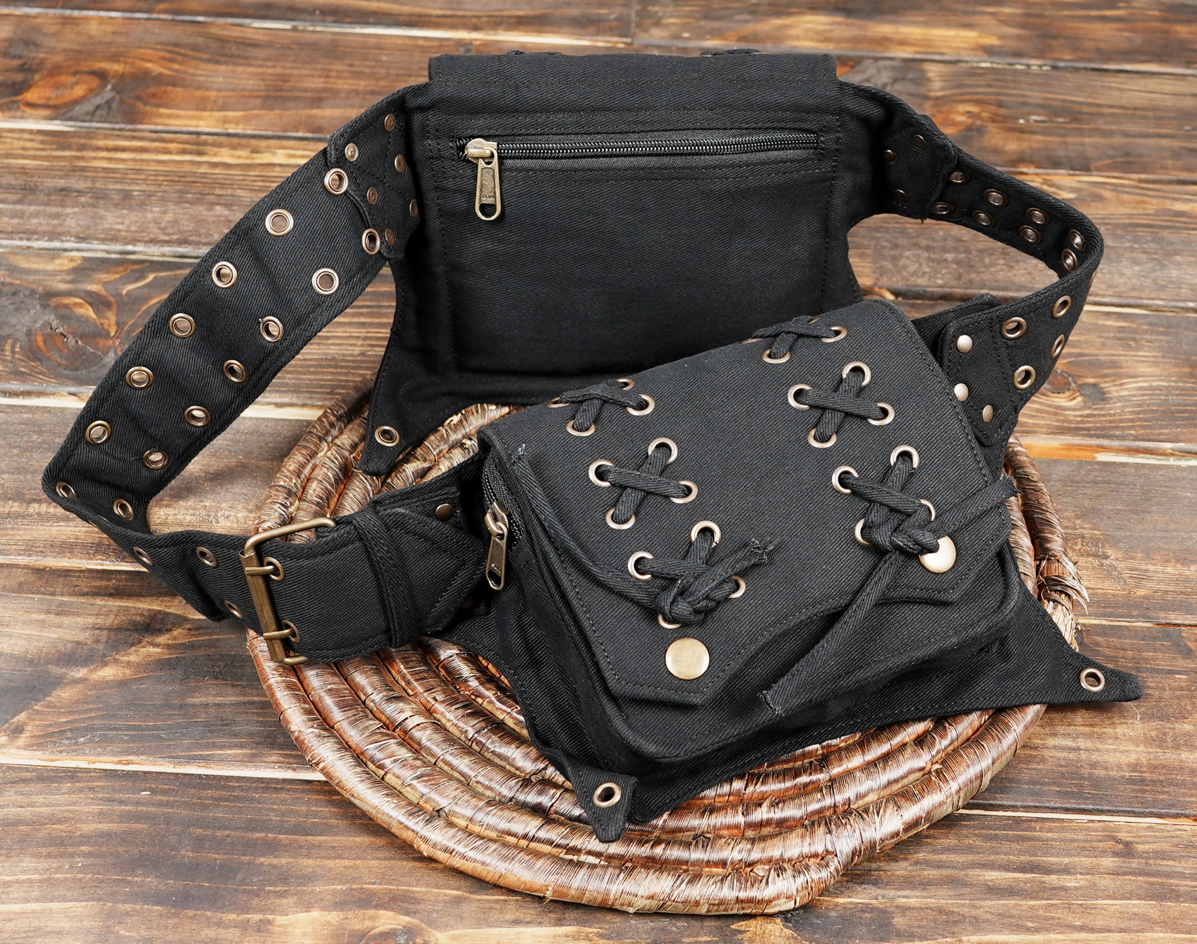 Rugged black canvas waist pouch belt with antique metal hardware.