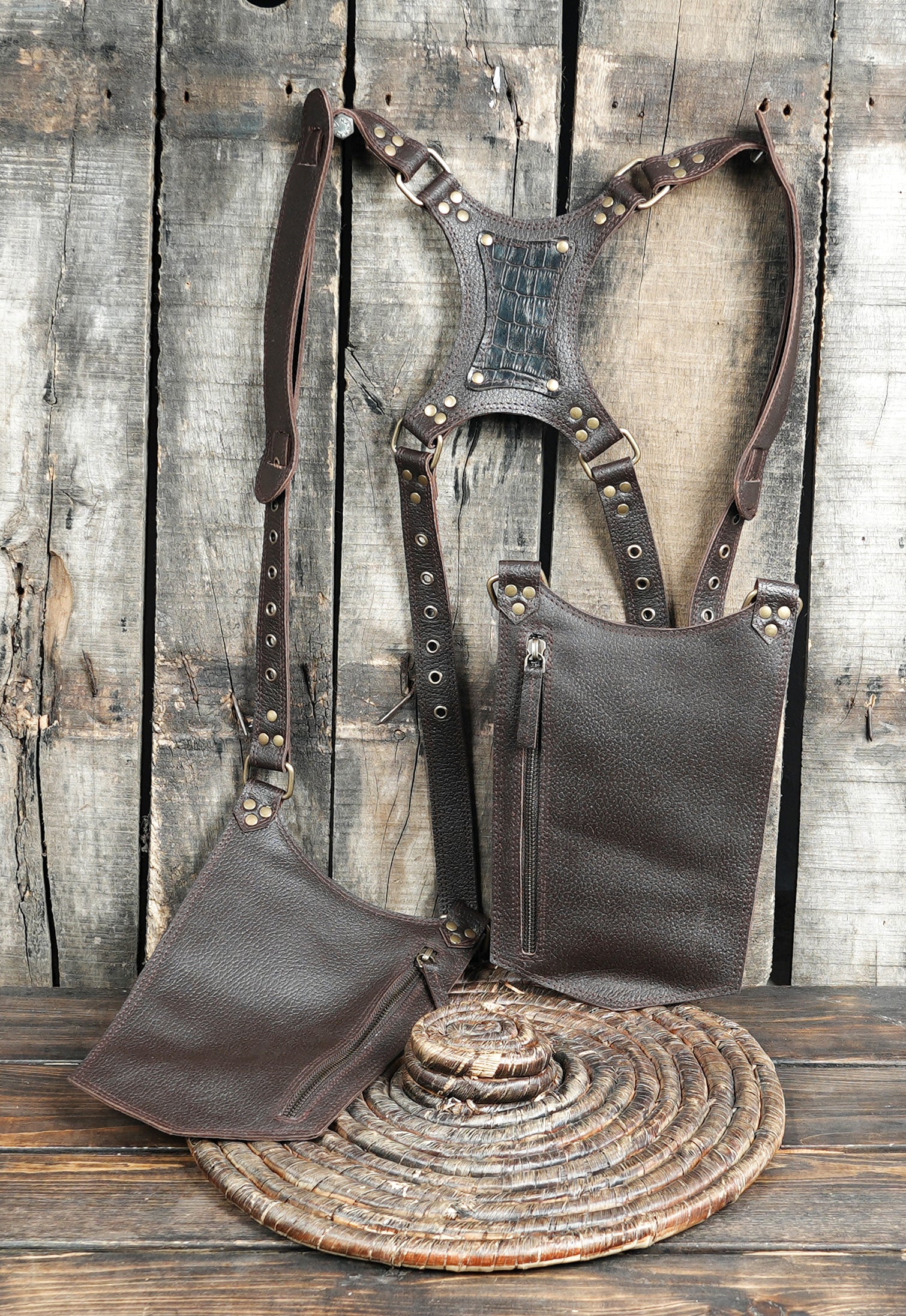 Adjustable leather harness holster for comfortable shoulder carry