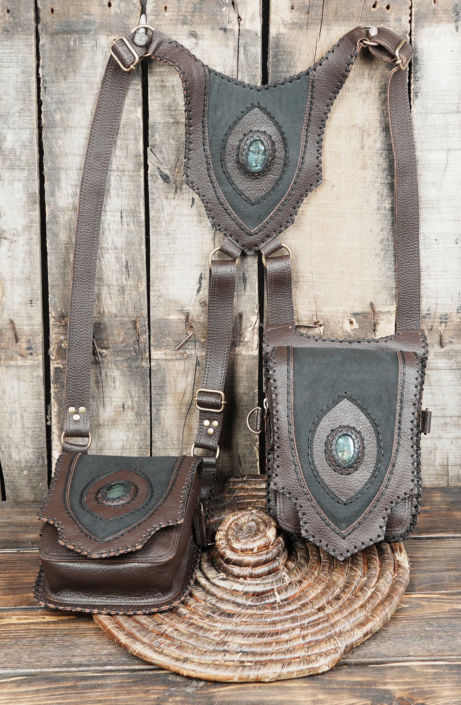 Medieval style leather holster with gemstone centerpiece and braided trim