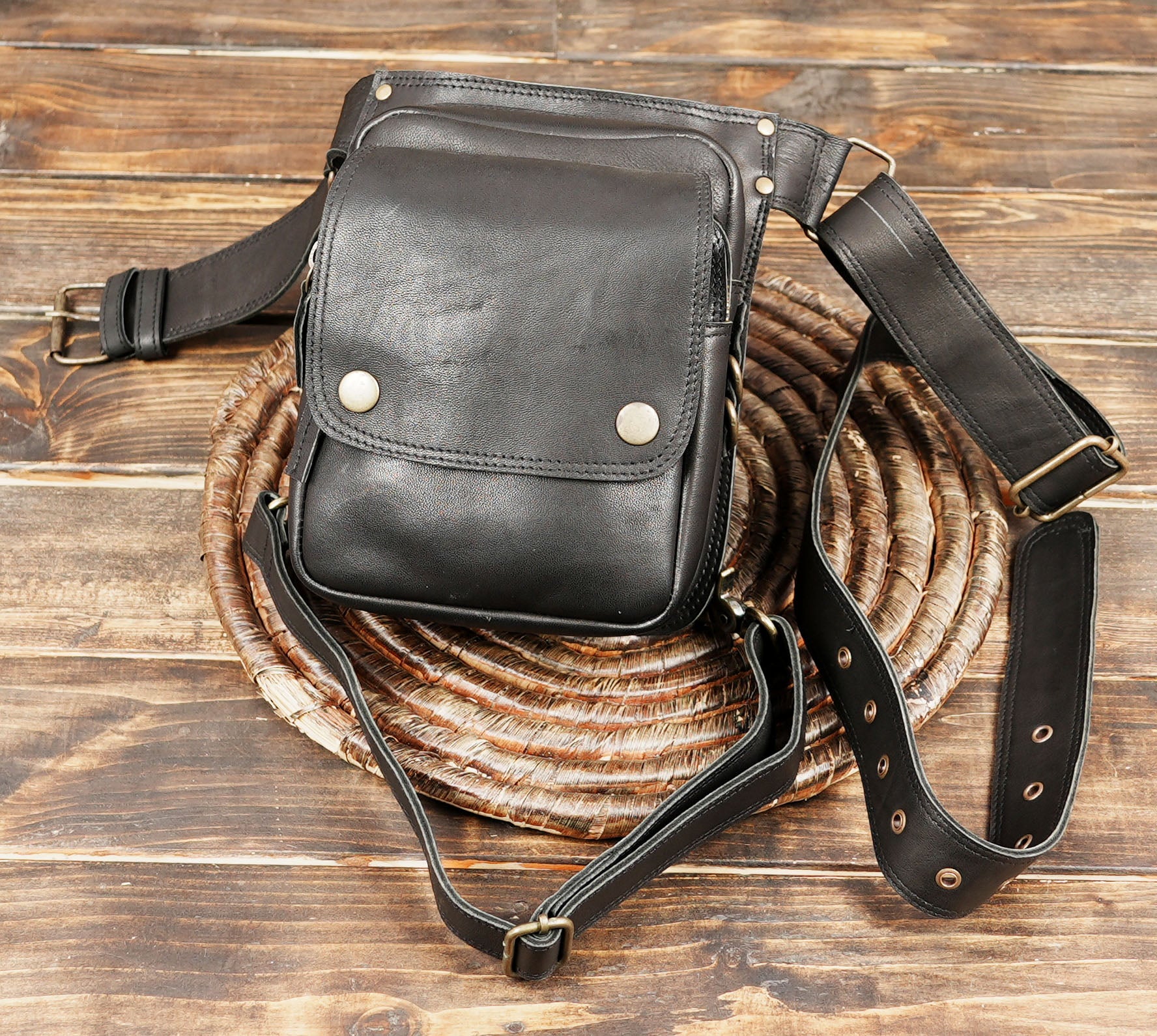 The spacious pouch offers ample room to store your phone, wallet, and small essentials,