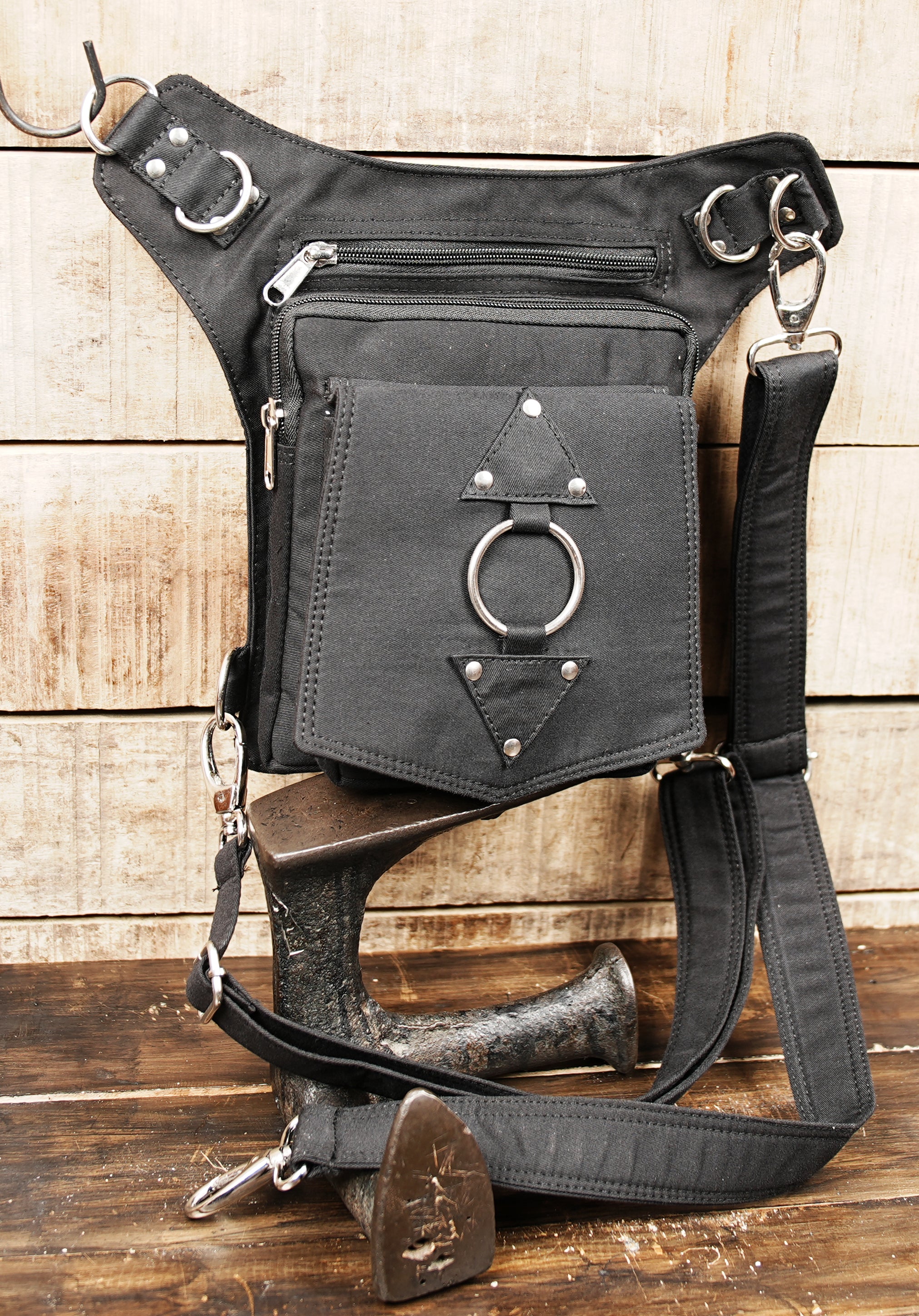 Black thigh holster bag with cotton construction and secure zipper compartments