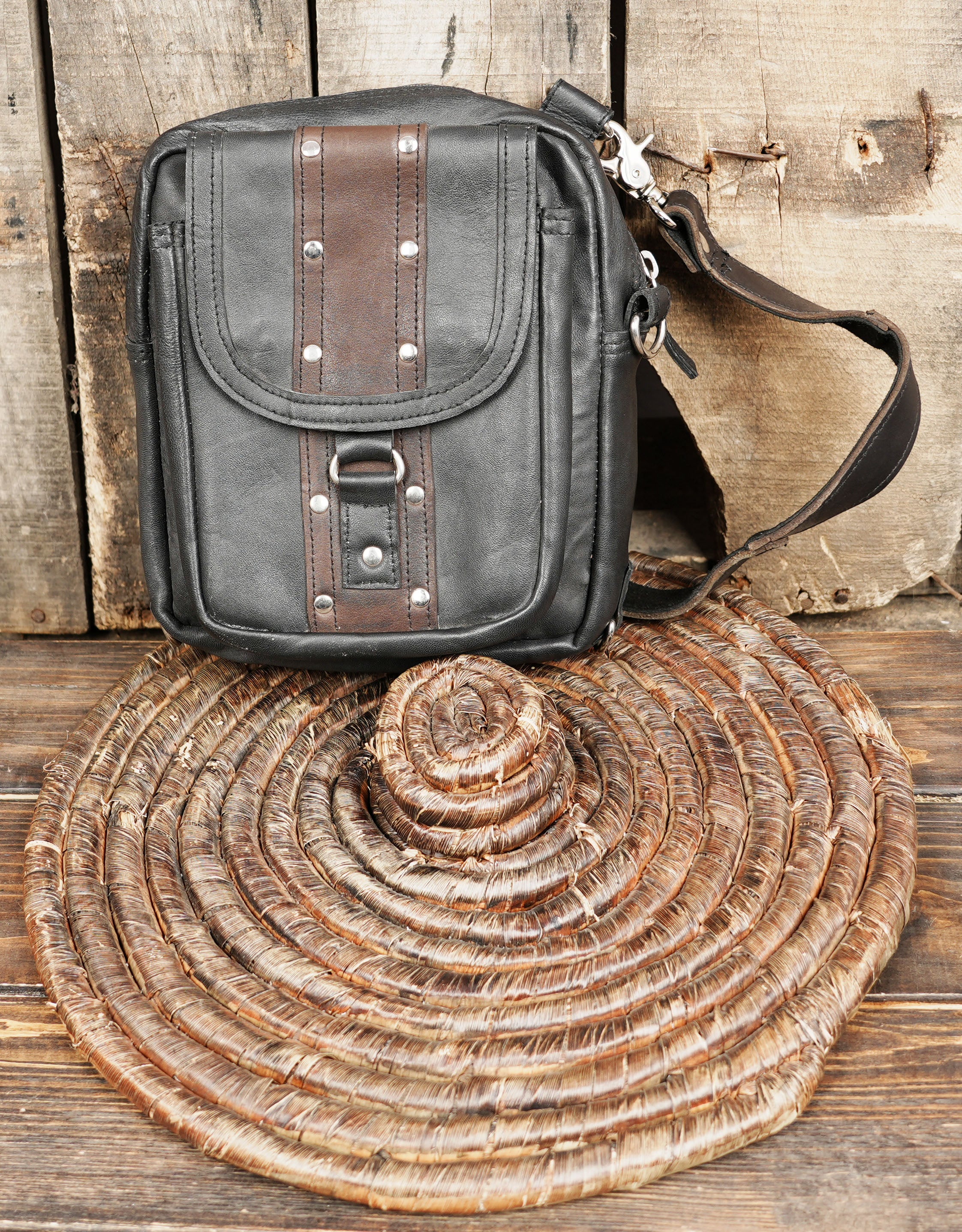 Compact waist bag with front flap and secure closure