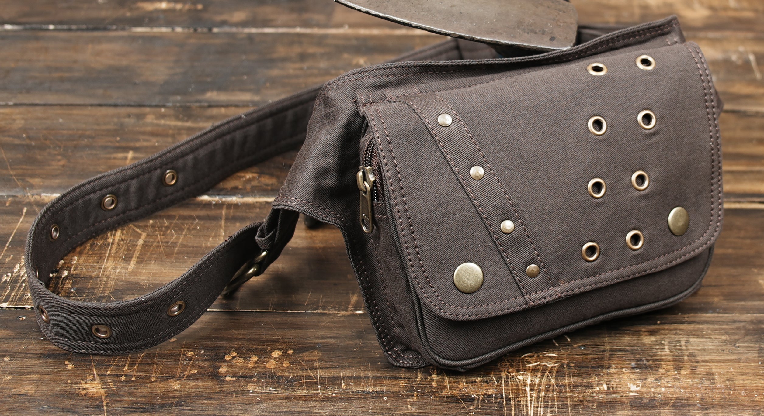 Adjustable canvas fanny pack with vintage metal details