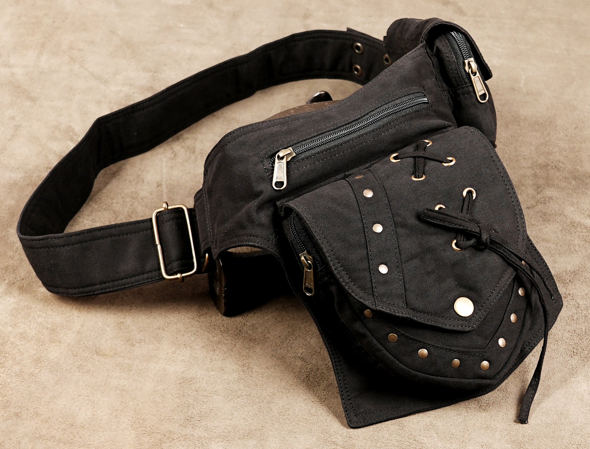 Black cotton side pouch belt with detachable snap pocket