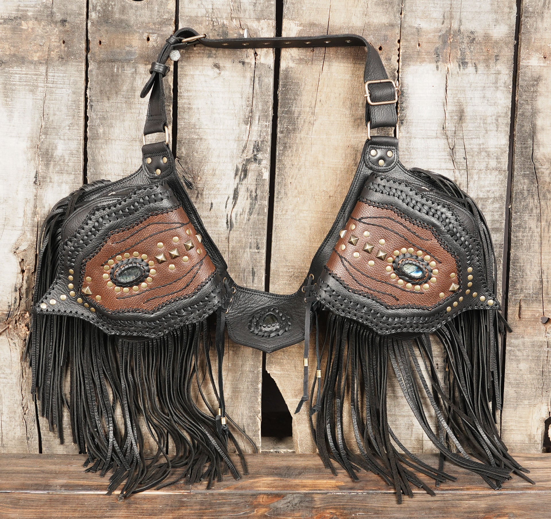 Black and brown leather waist belt with western fringe and metal studs
