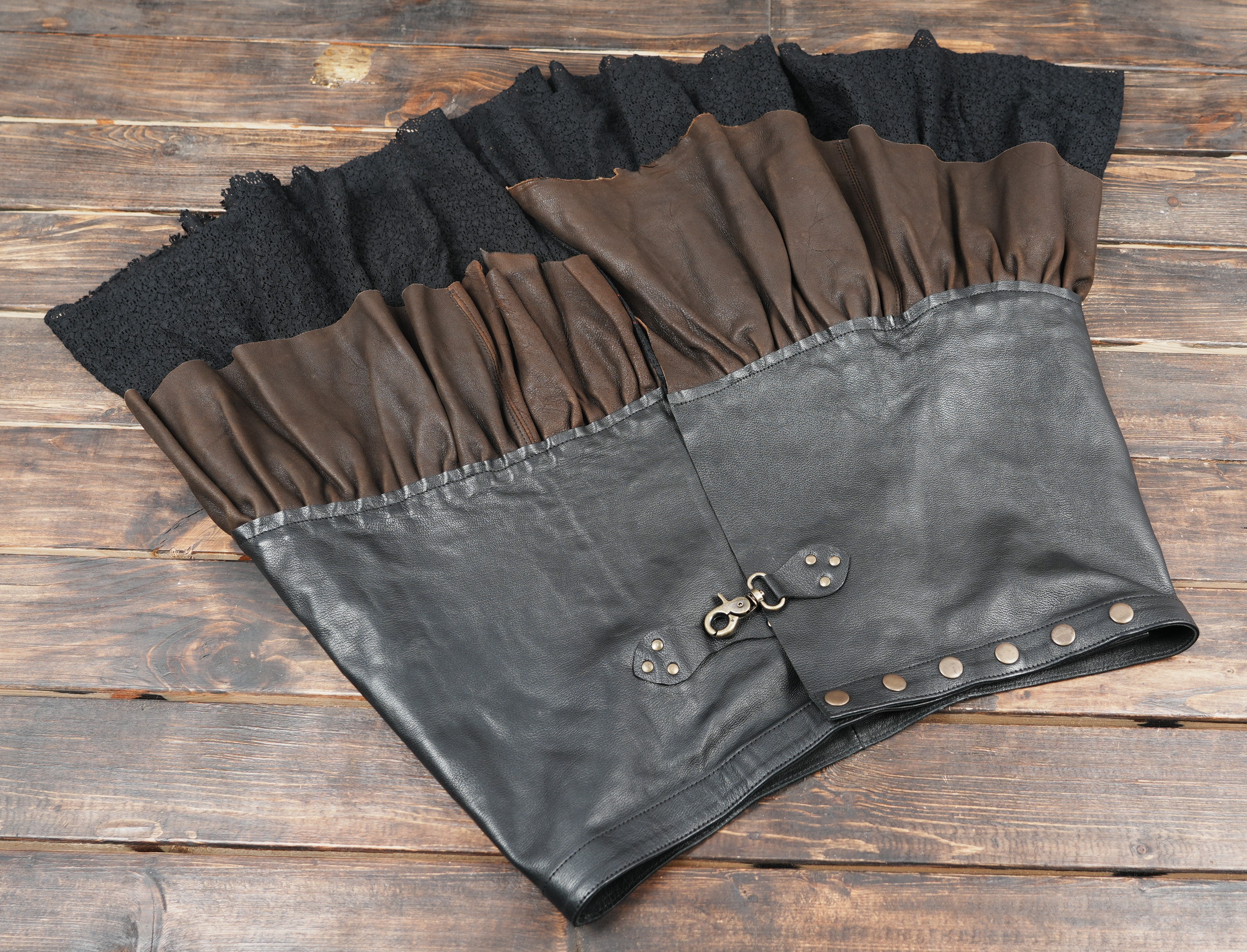 Layered leather skirt belt with decorative clasp
