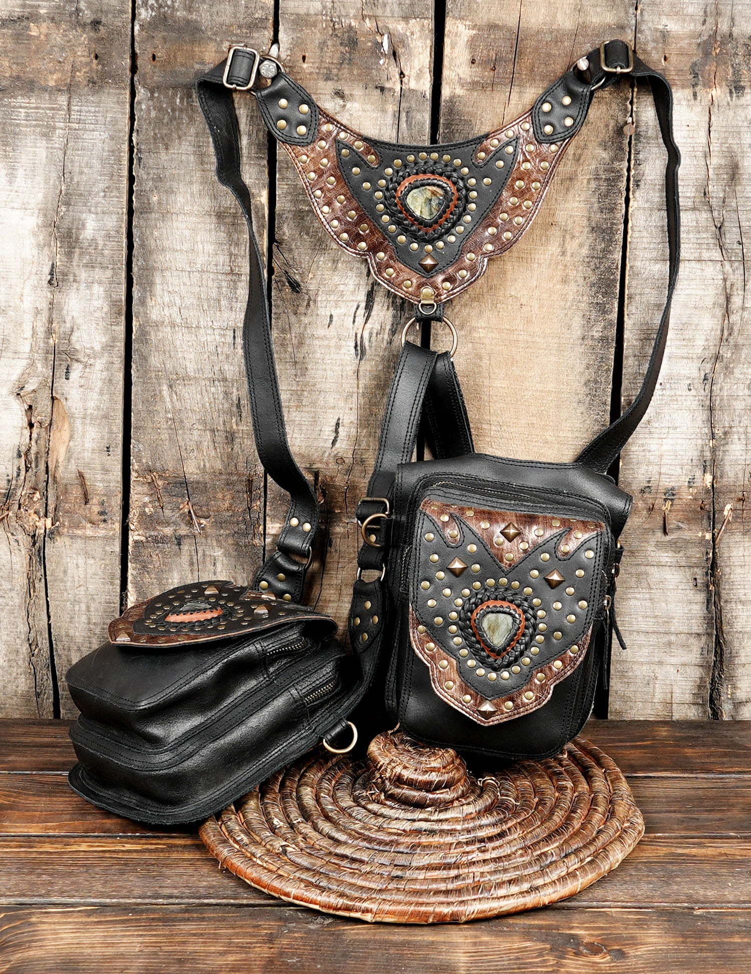 “Double pouch leather crossbody holster with gemstone teardrop centerpiece and woven top plate”