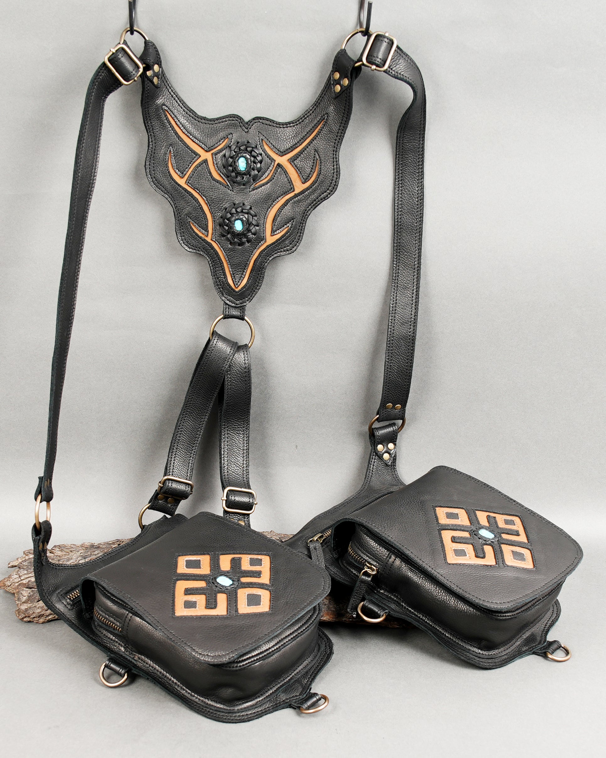 Leather hip bag with geometric pattern design and front zipper.