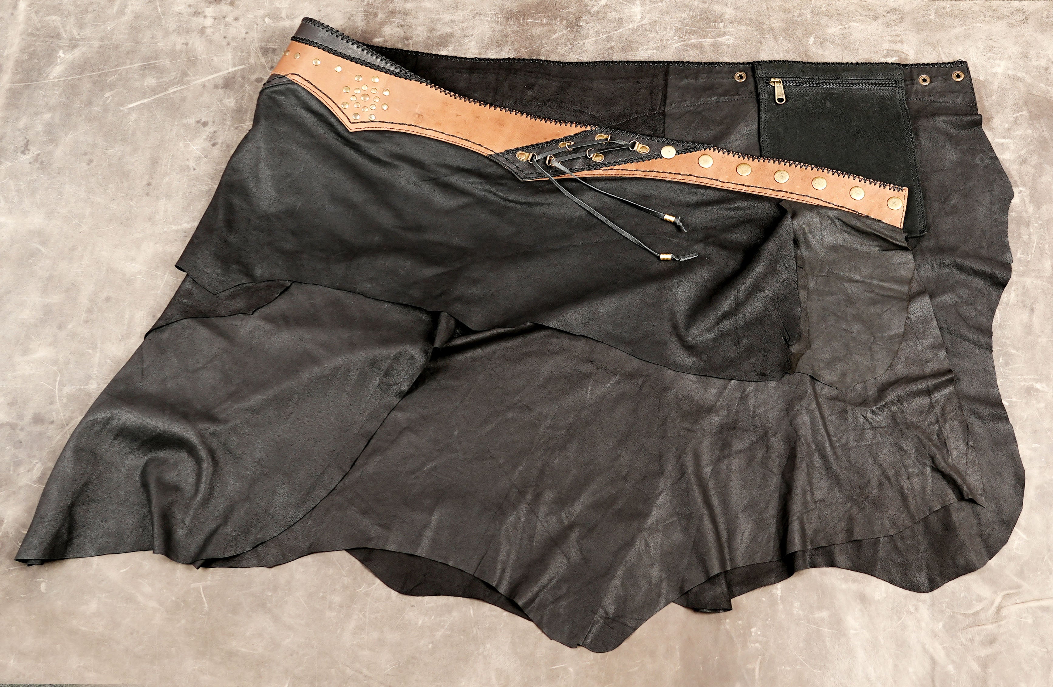 Women’s Black Leather Skirt with Decorative Studs and Gemstone Waist Detail