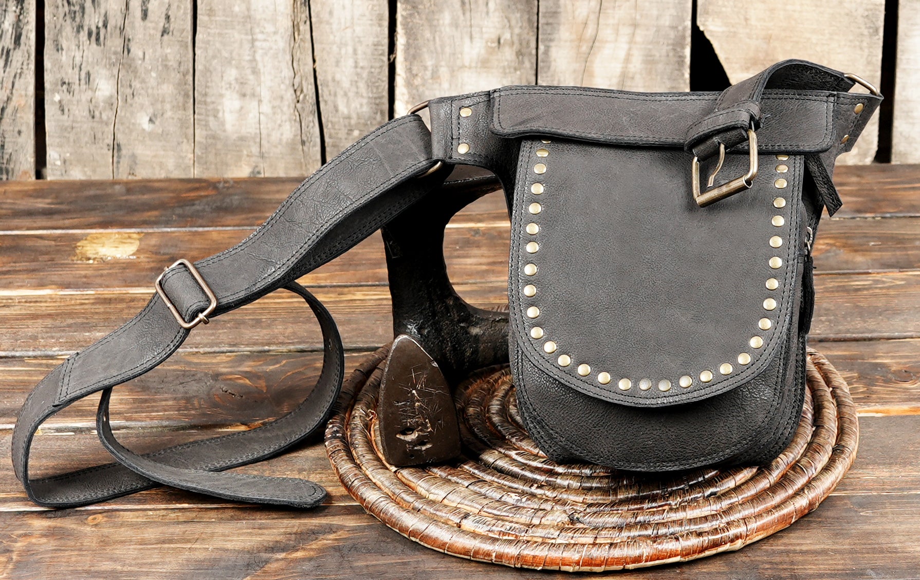 Black leather waist belt with practical storage pouch