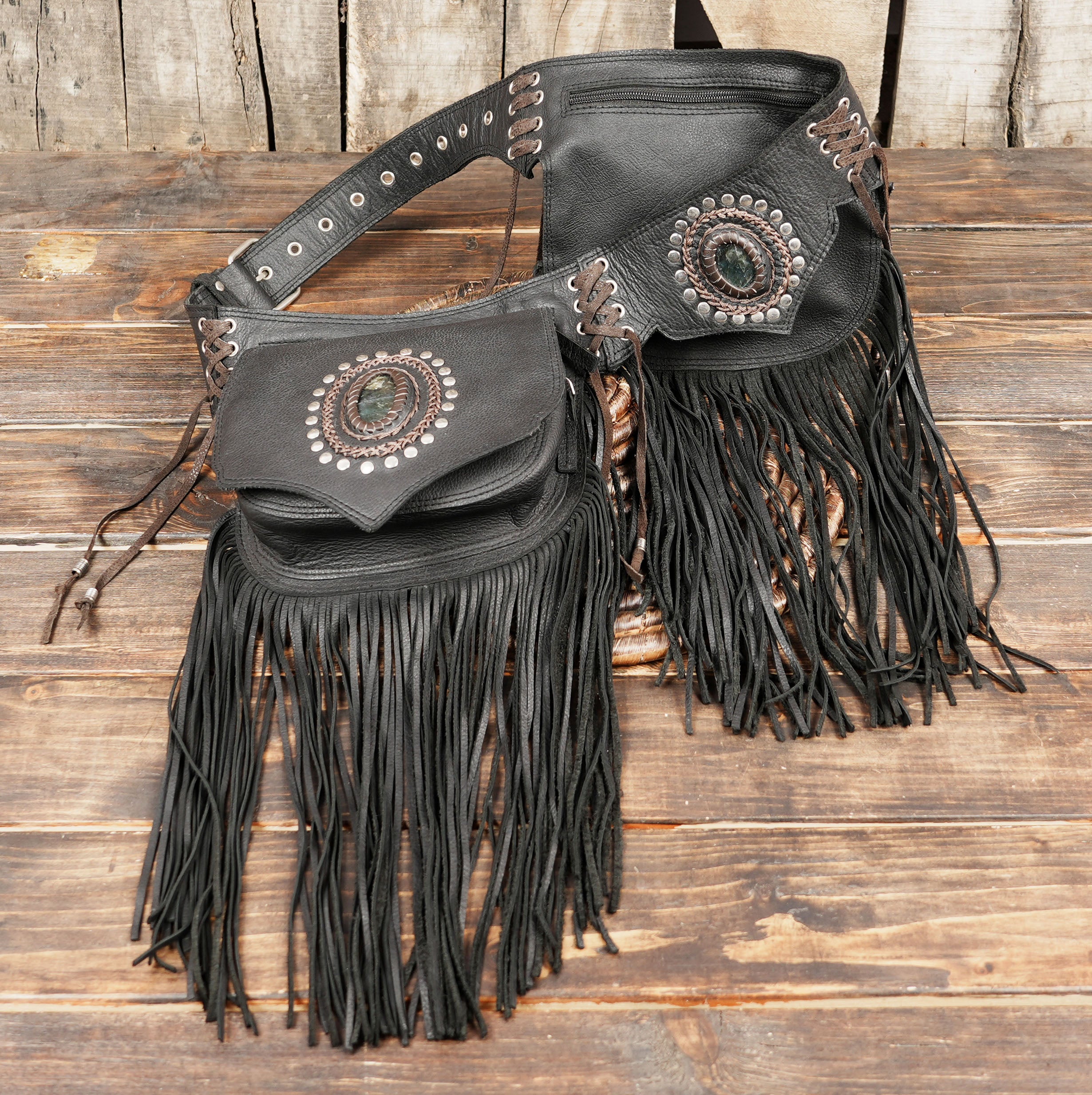 Handcrafted leather hip belt with fringe and stone centerpiece