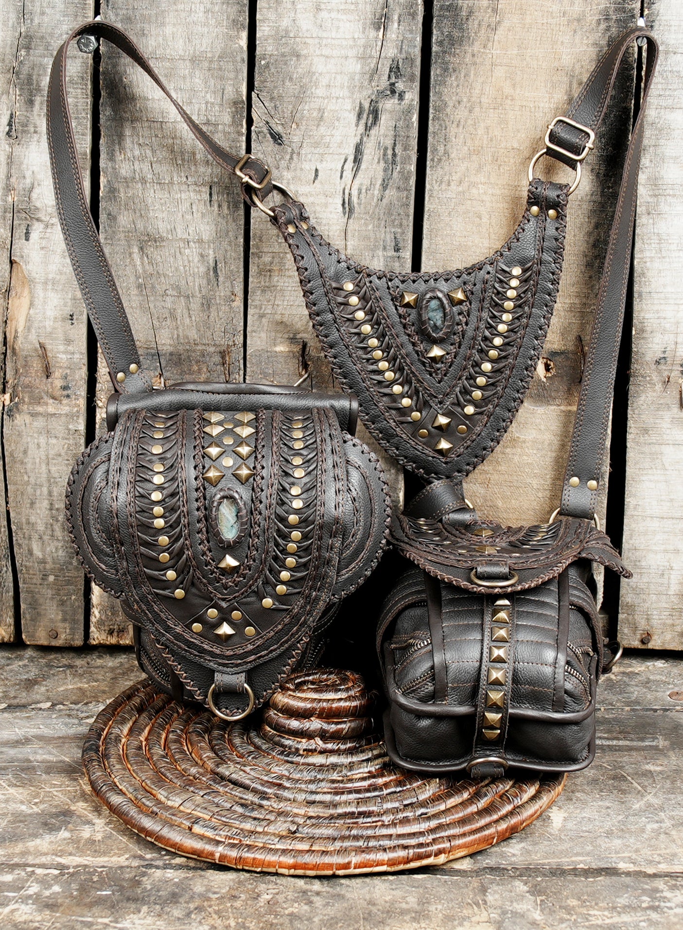 “Rustic brown leather holster set with gemstone detail and adjustable straps”