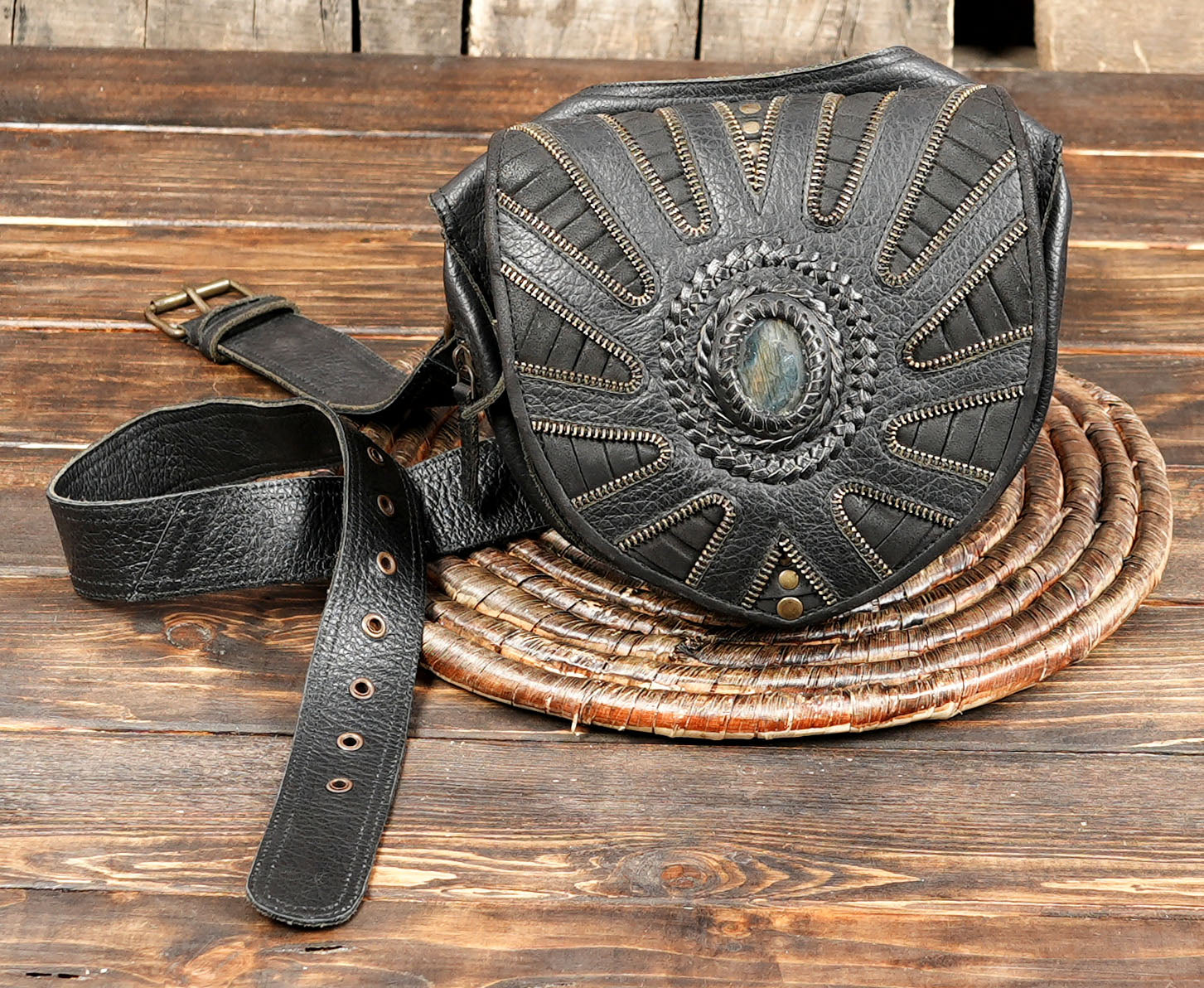 Premium black leather hip bag with gemstone and brass hardware