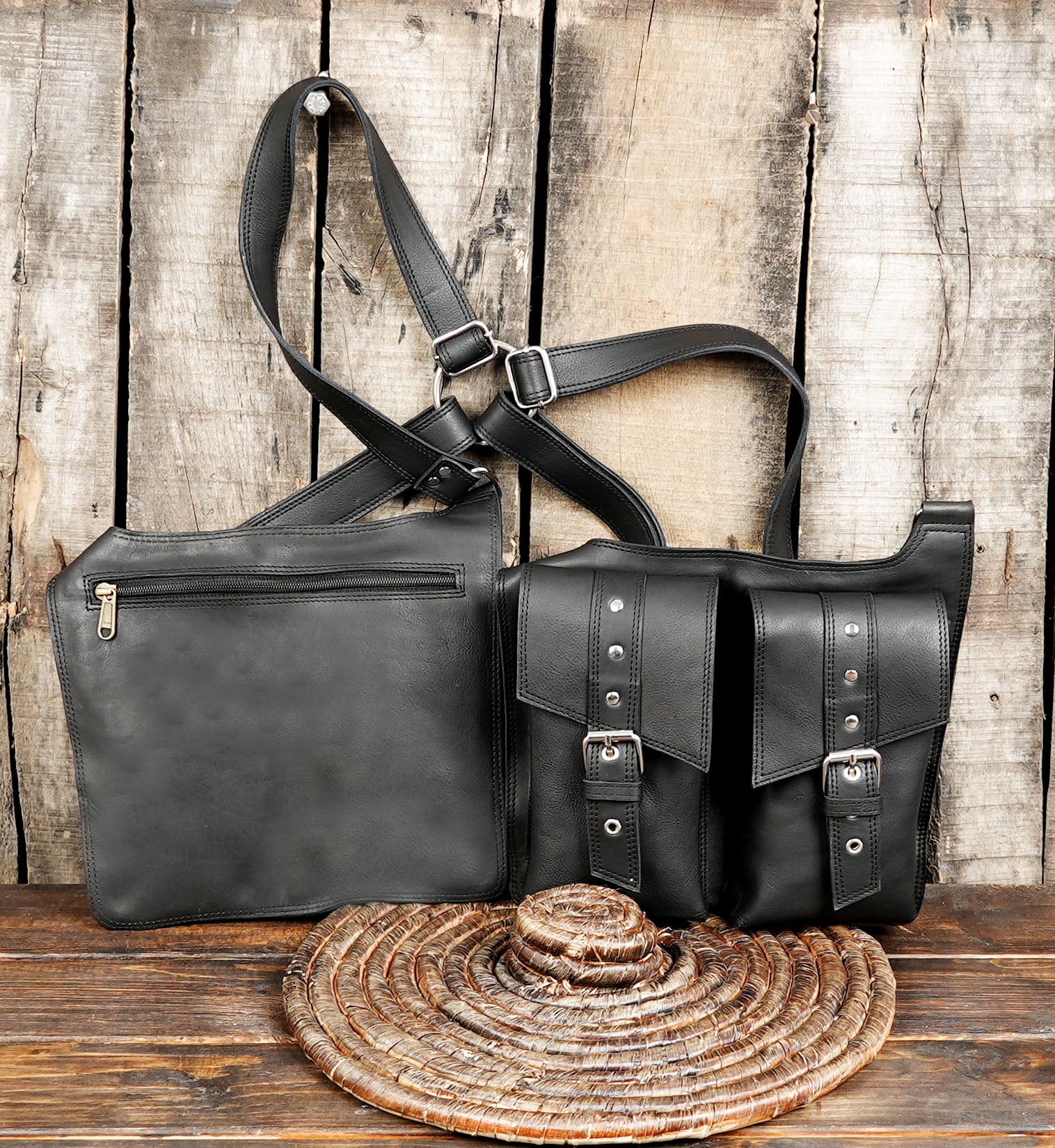 Functional black leather holster bag with metal hardware