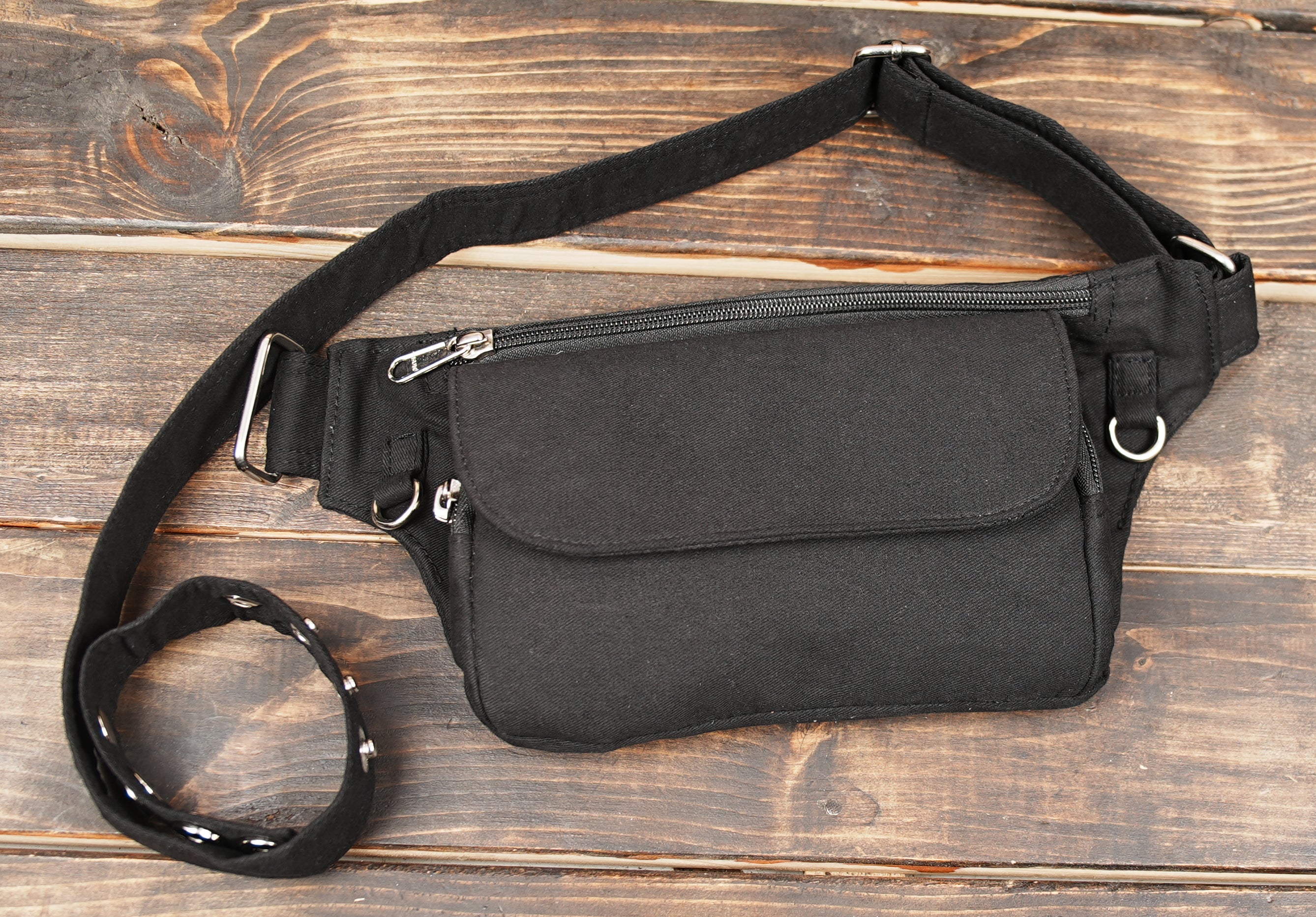 Simple black bum bag ideal for travel and daily use