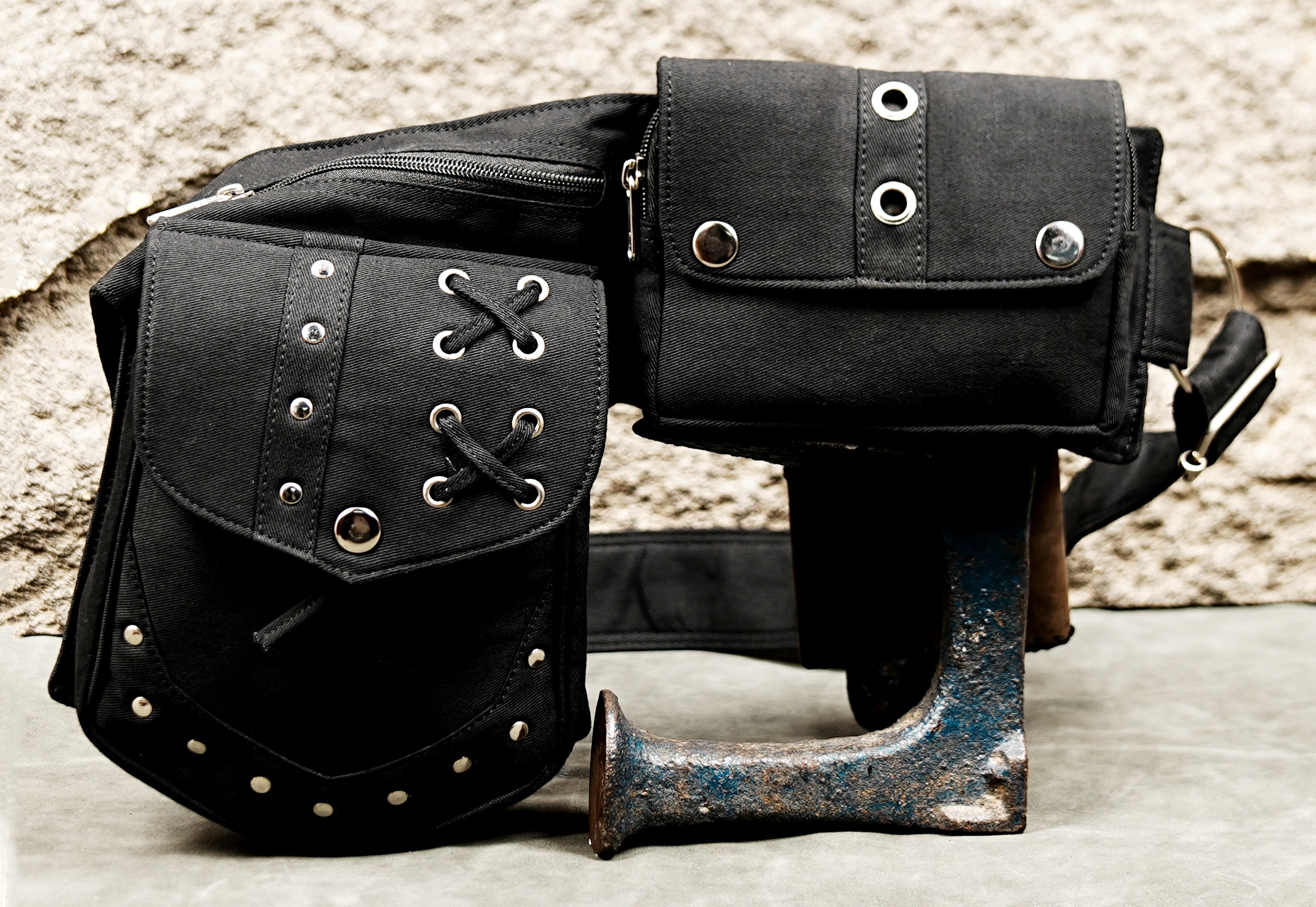 Black canvas-style cotton waist belt with silver-tone hardware and adjustable buckle for alternative fashion.