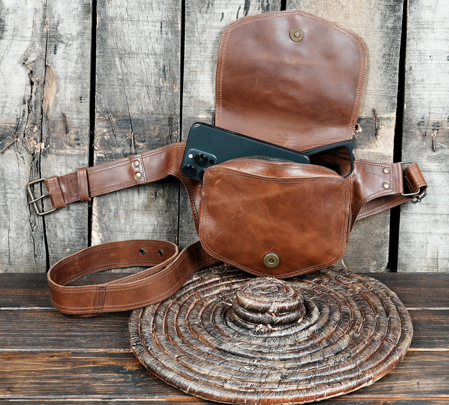 Adjustable leather waist belt with front pouch design