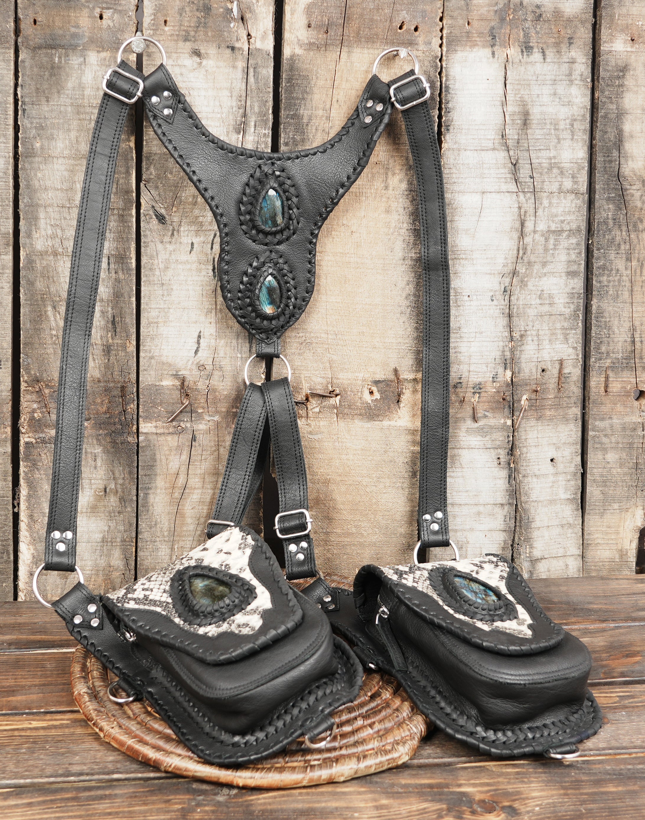 Unisex black leather adventure holster with secure strap design