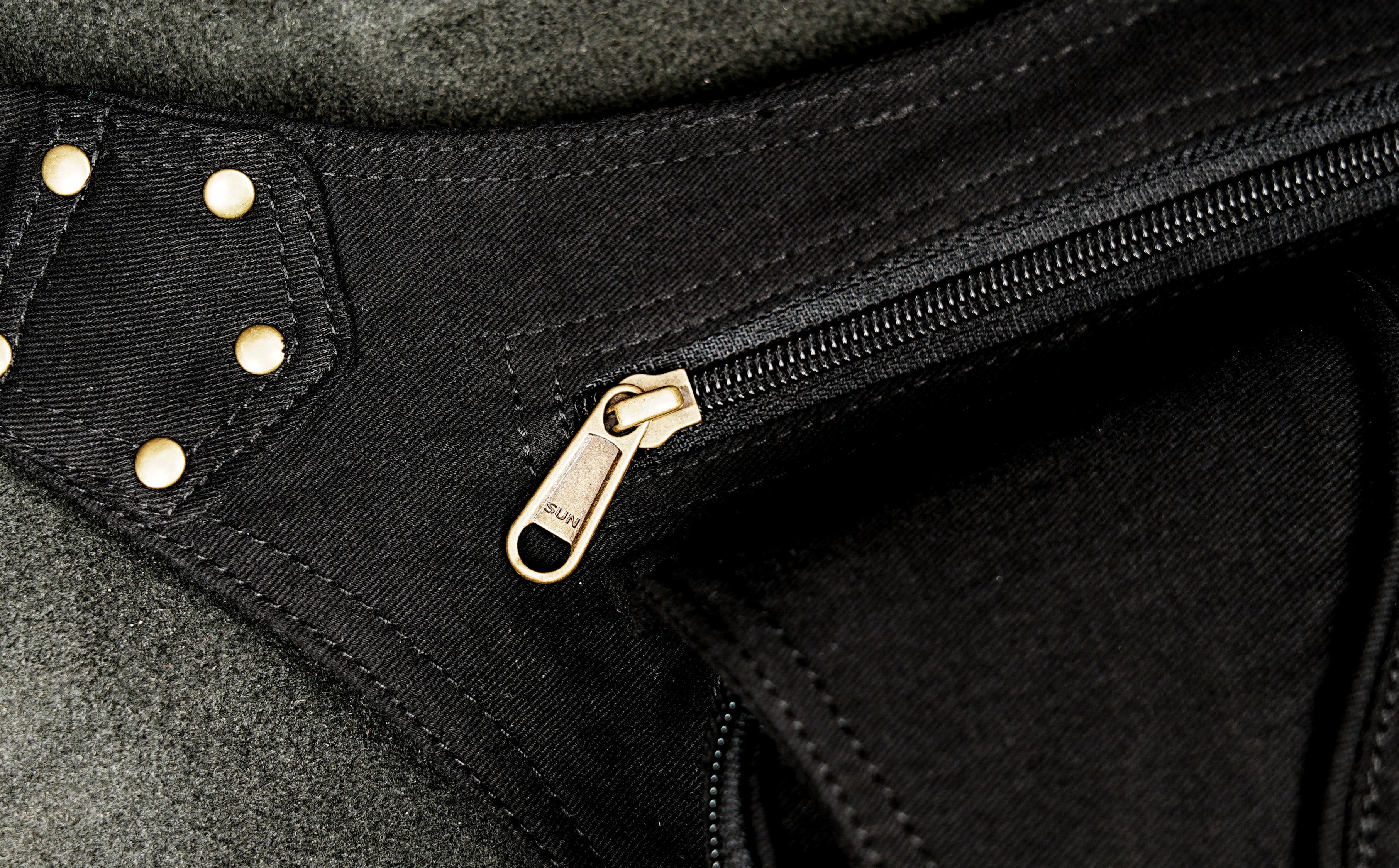 Handmade black canvas thigh pouch with curved flap and metal snap buttons