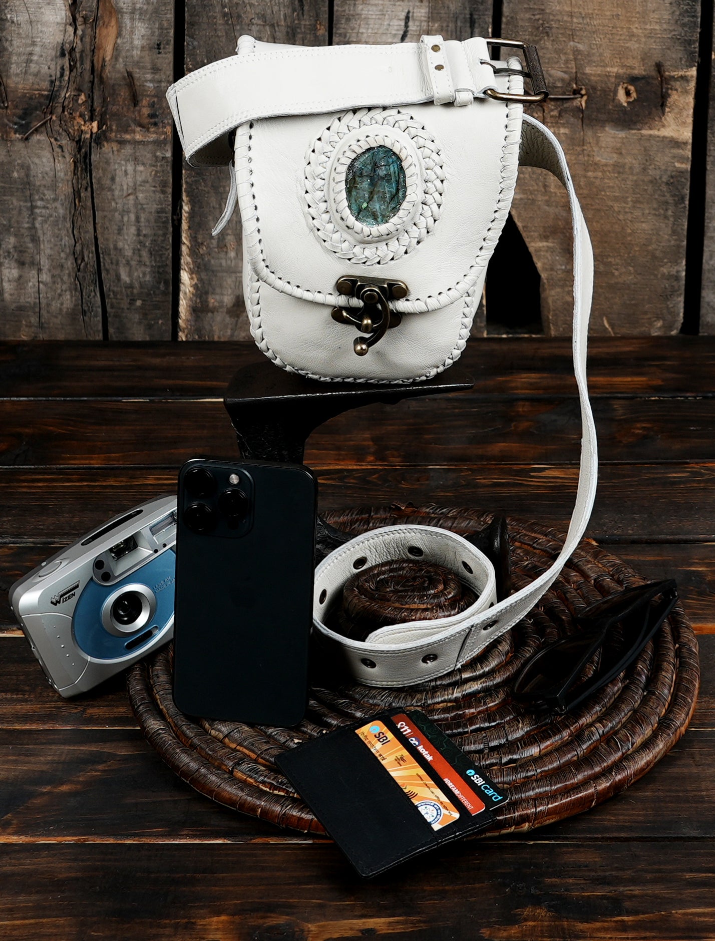 Stylish festival belt bag crafted from white leather and a gemstone charm