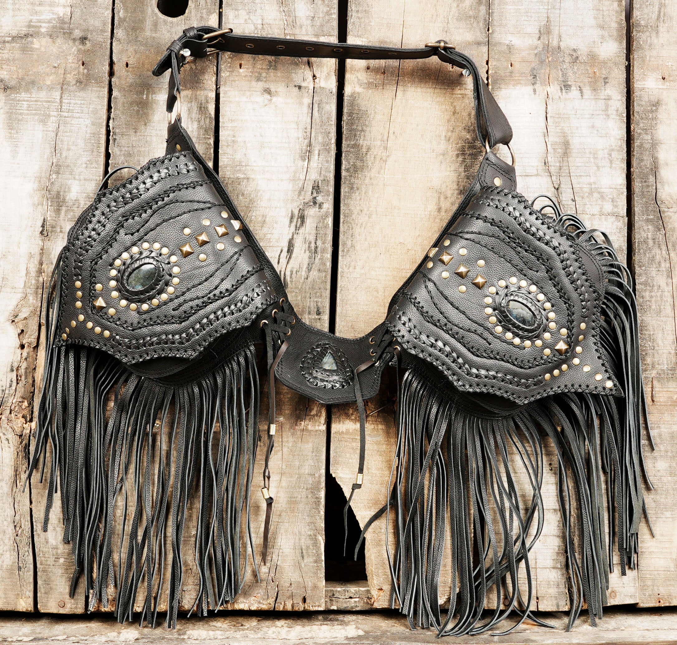 Close-up of gemstone detail on leather festival belt bag