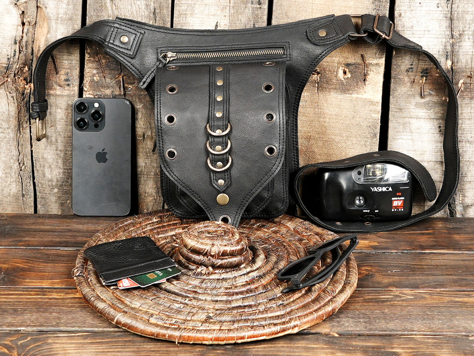 Unisex black leather waist pouch with rugged hardware