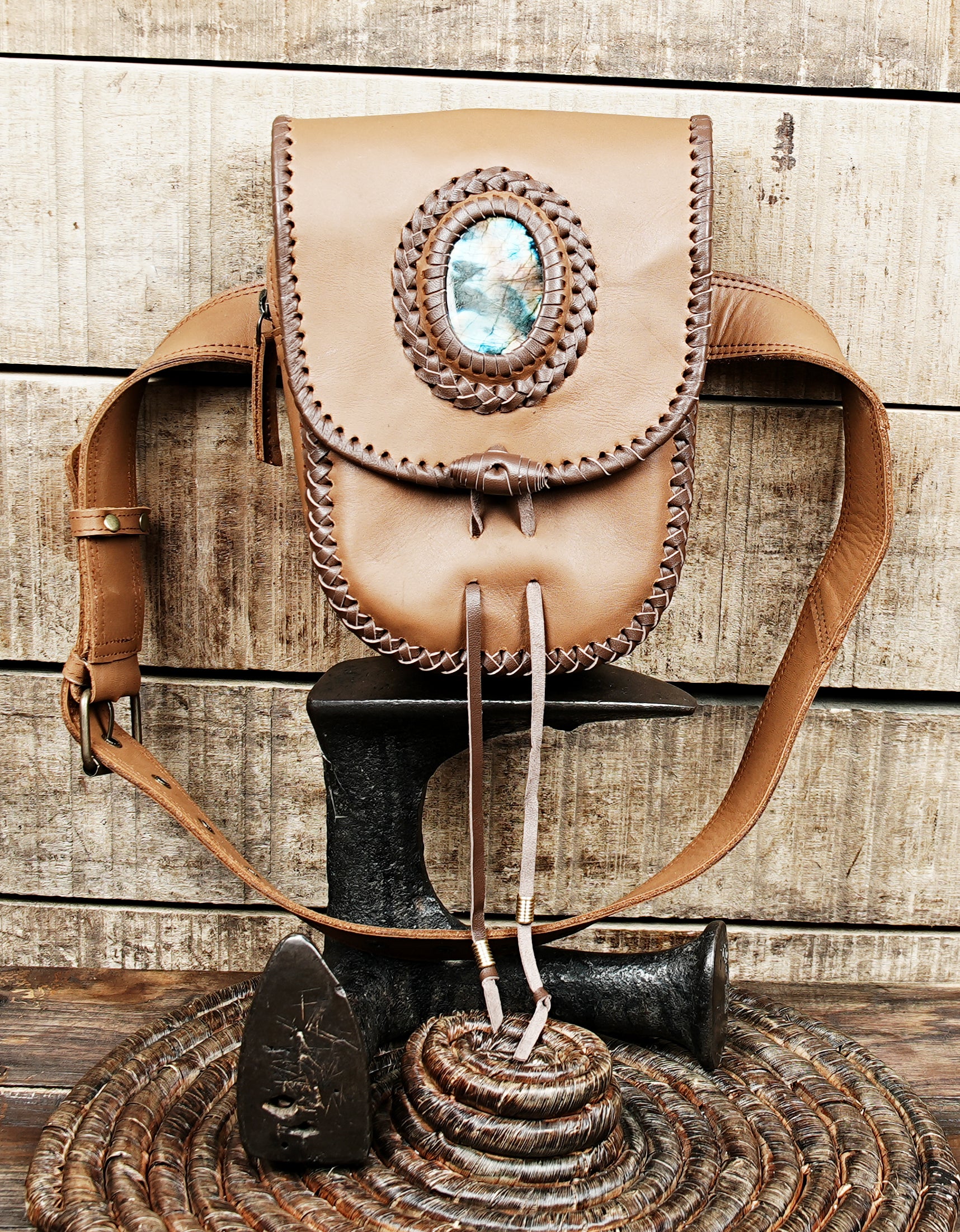Artisan leather waist belt bag with decorative stone centerpiece
