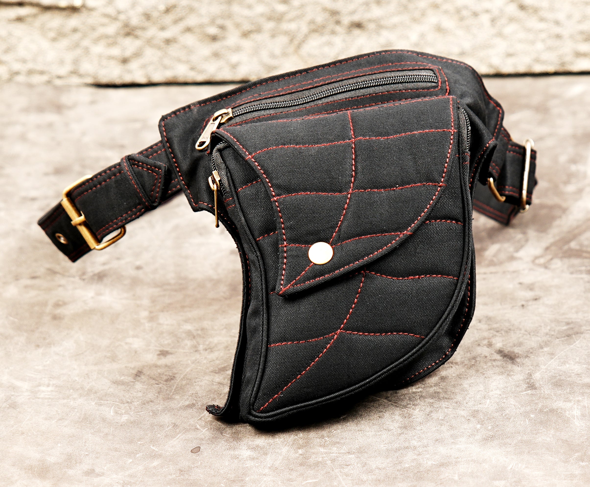 Pixie fairy style pocket belt with geometric red stitching details