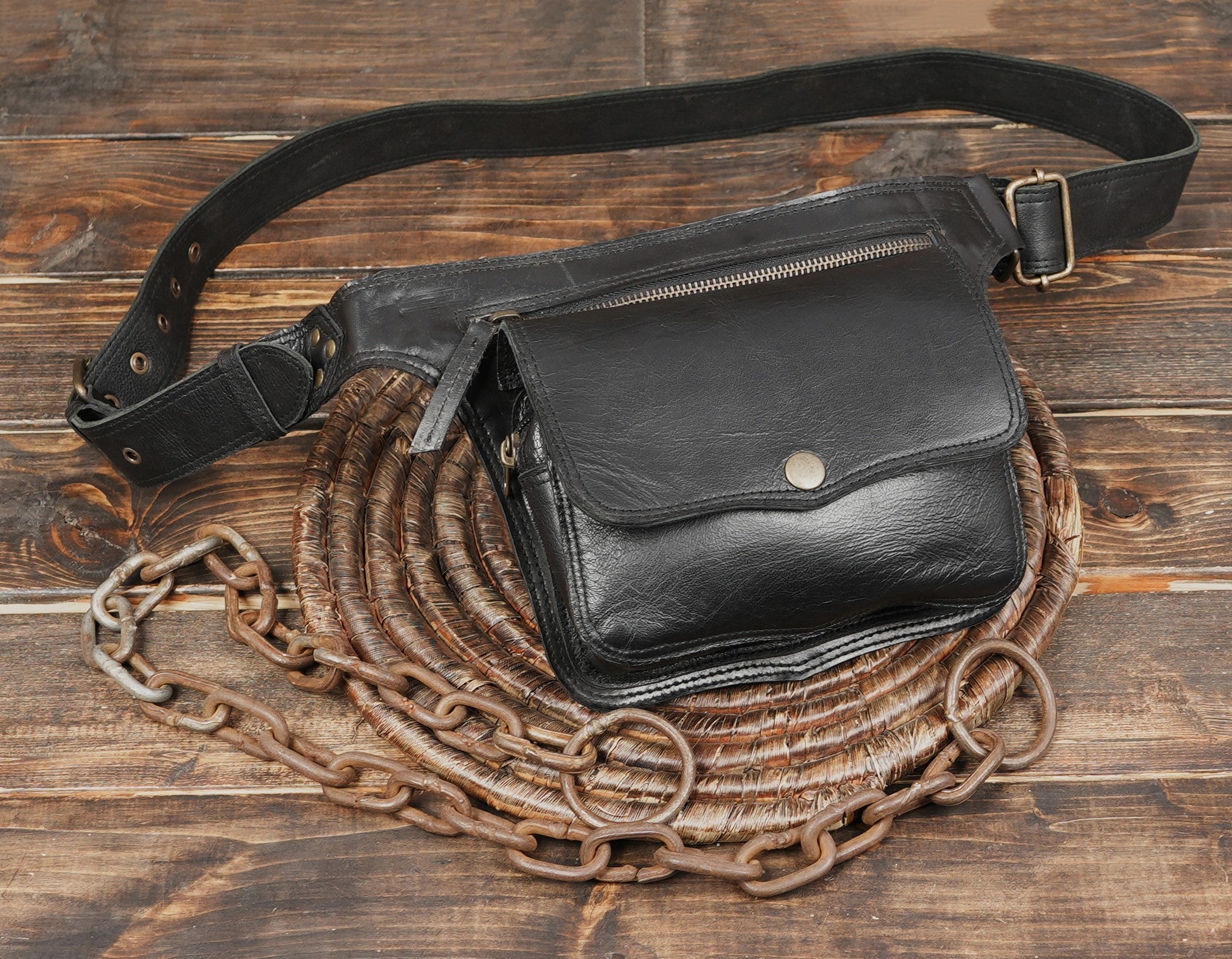 Black leather fanny pack style belt with adjustable buckle
