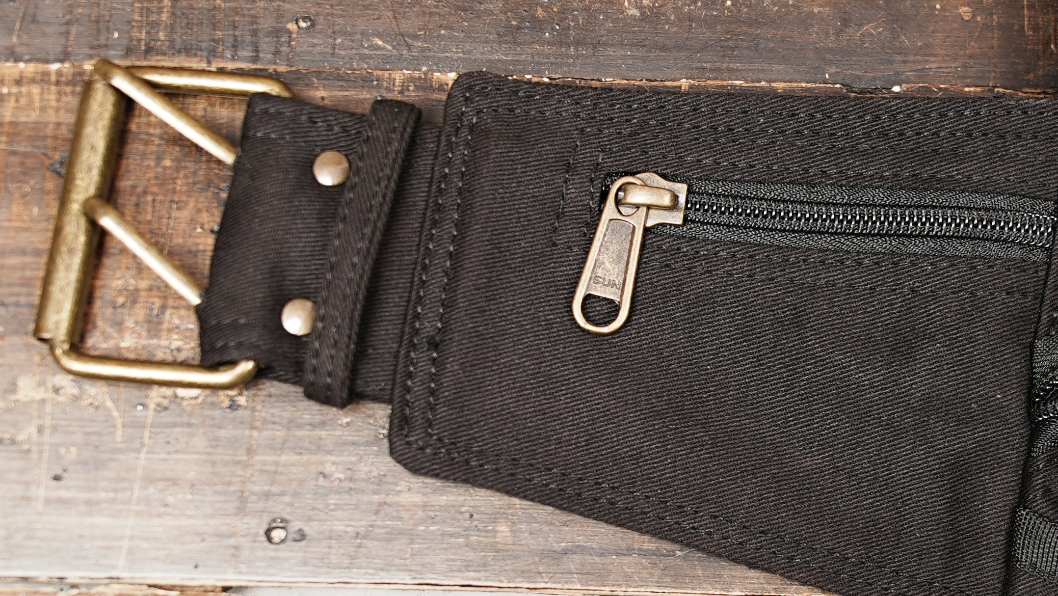 Lightweight cotton utility pack with adjustable belt and organizer pockets