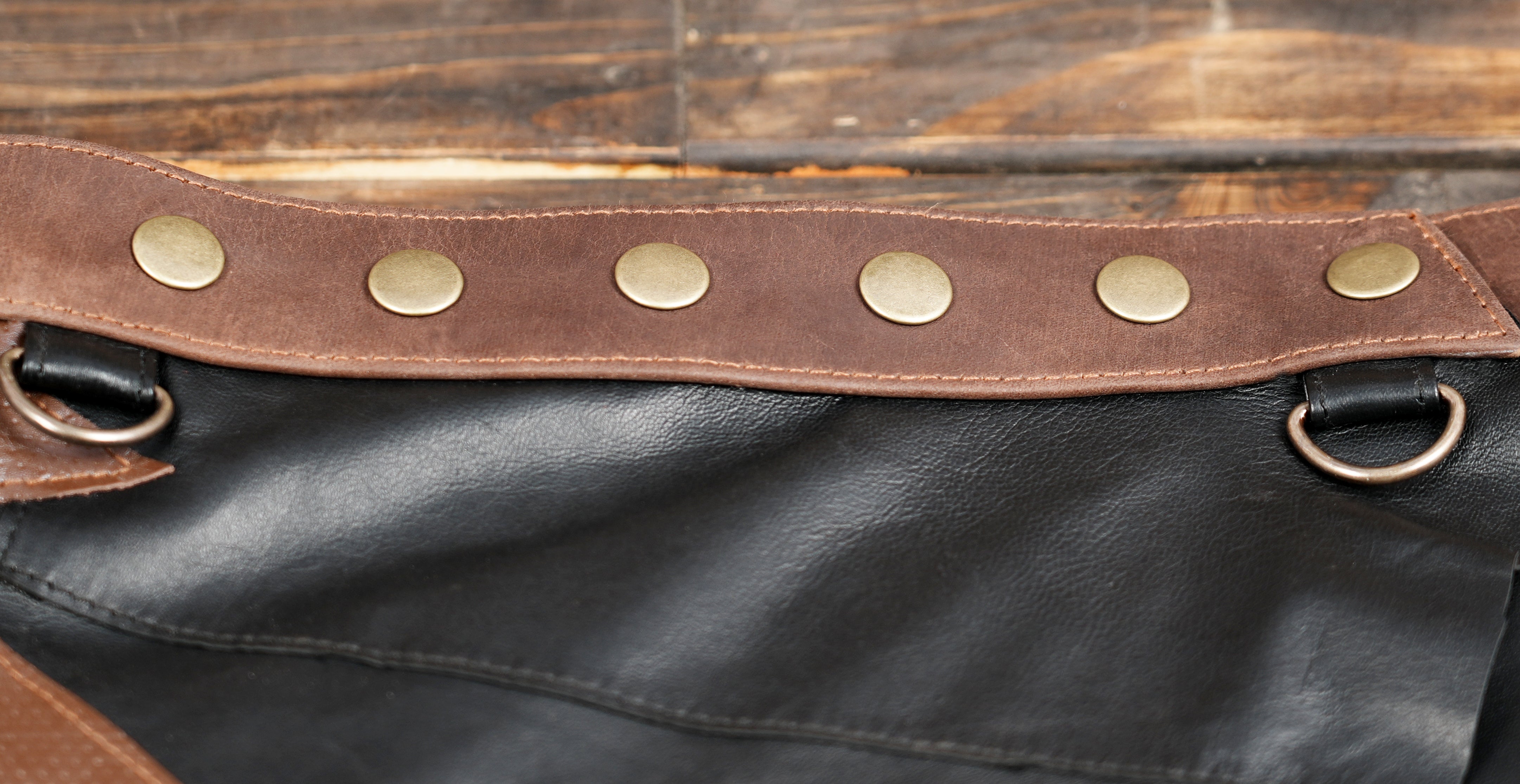 Unique leather skirt with textured contrast and adjustable waist straps