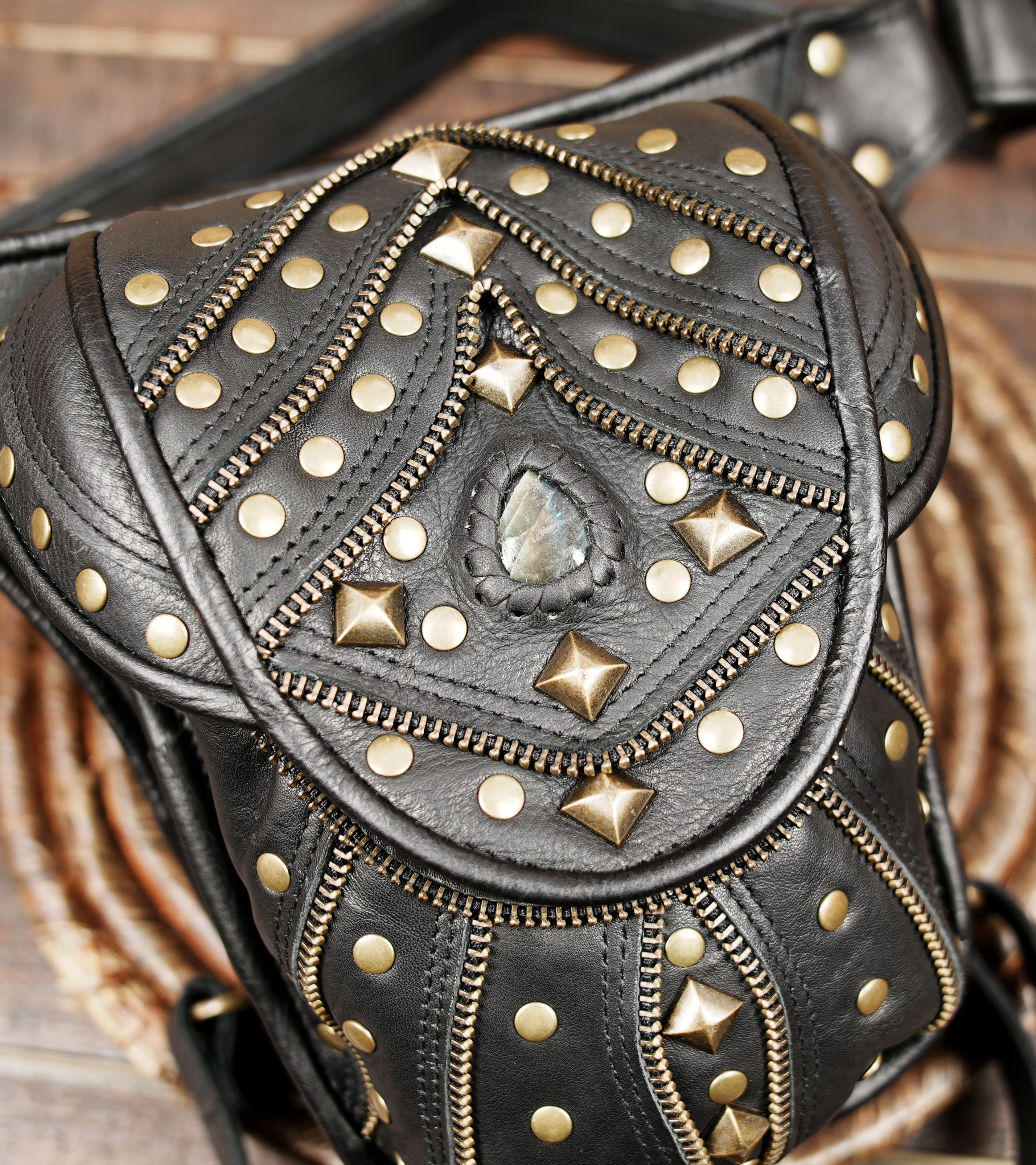 artisan leather utility belt bag with gemstone and embossed pattern design