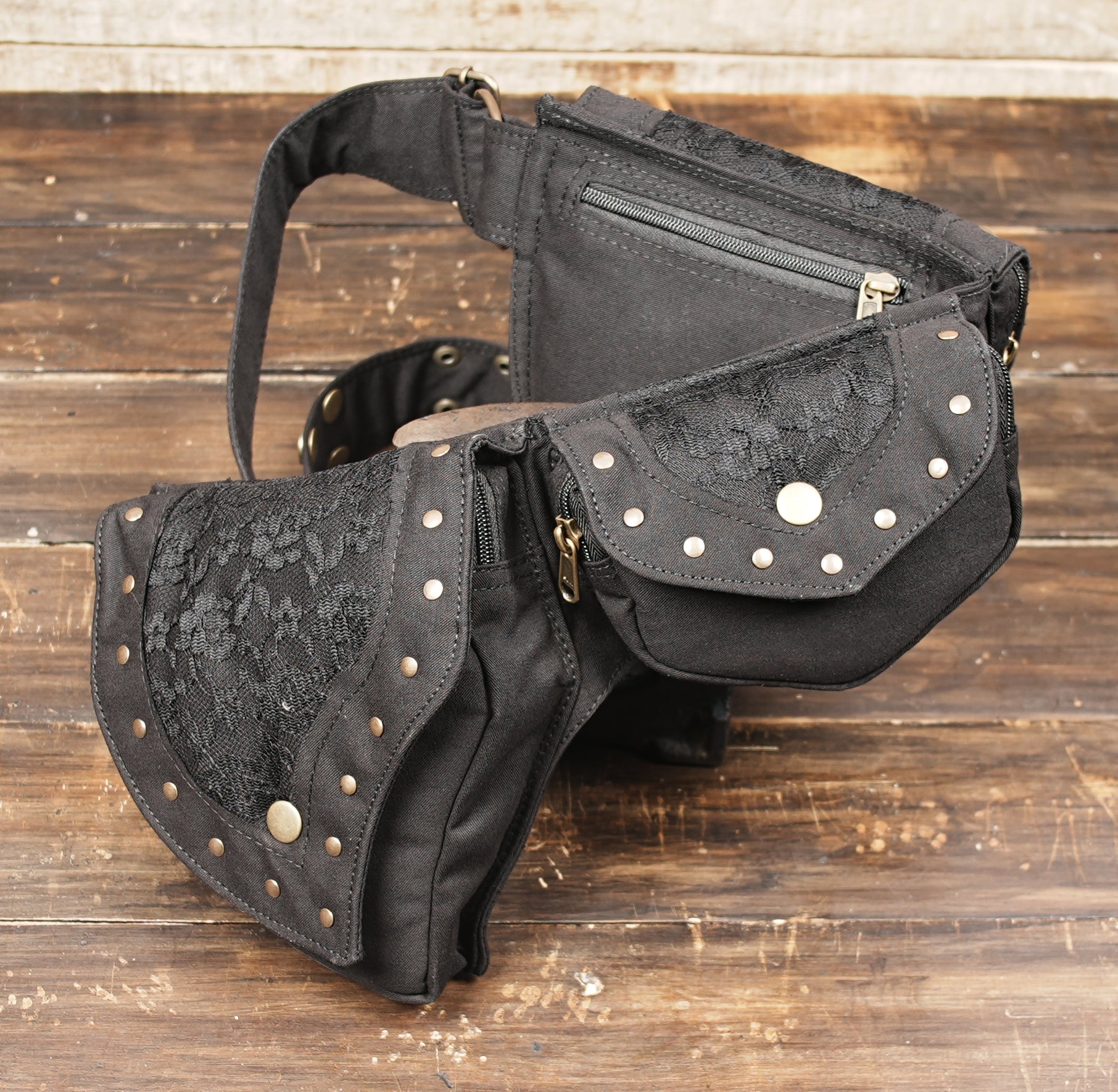 Three pocket festival hip bag with brass grommets and lace overlay details