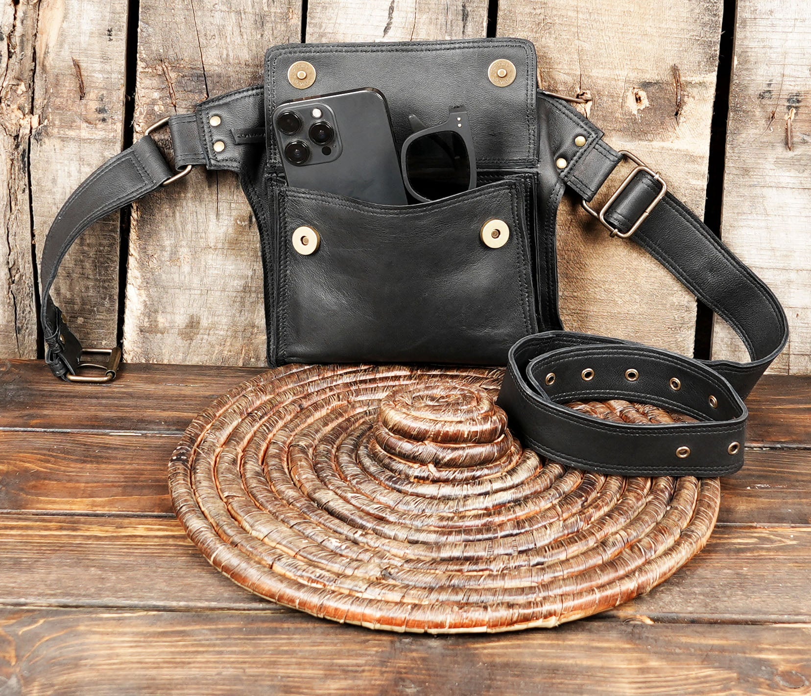 Sleek black leather utility belt bag for travel and daily use