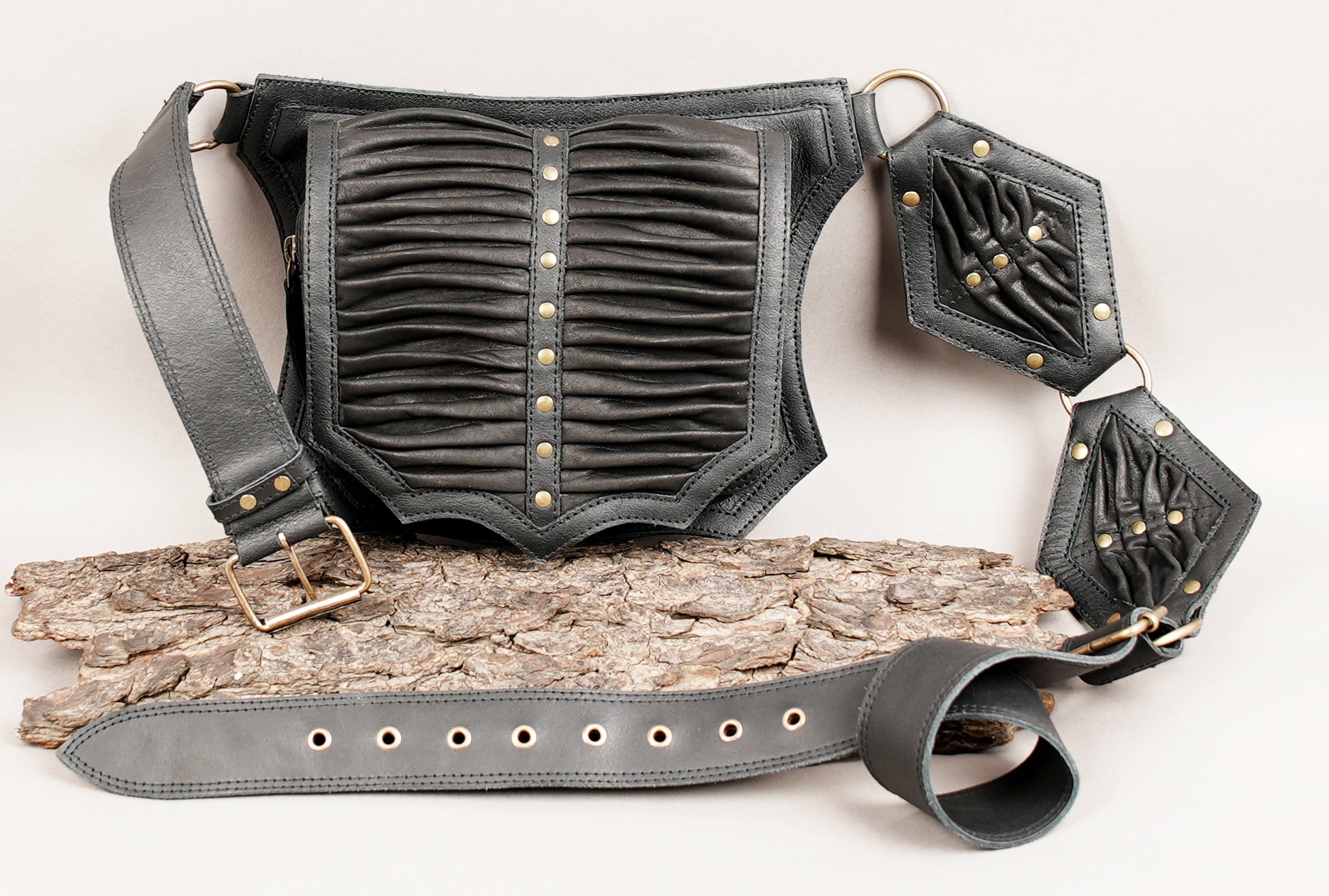 Handcrafted leather waist belt with front storage pocket