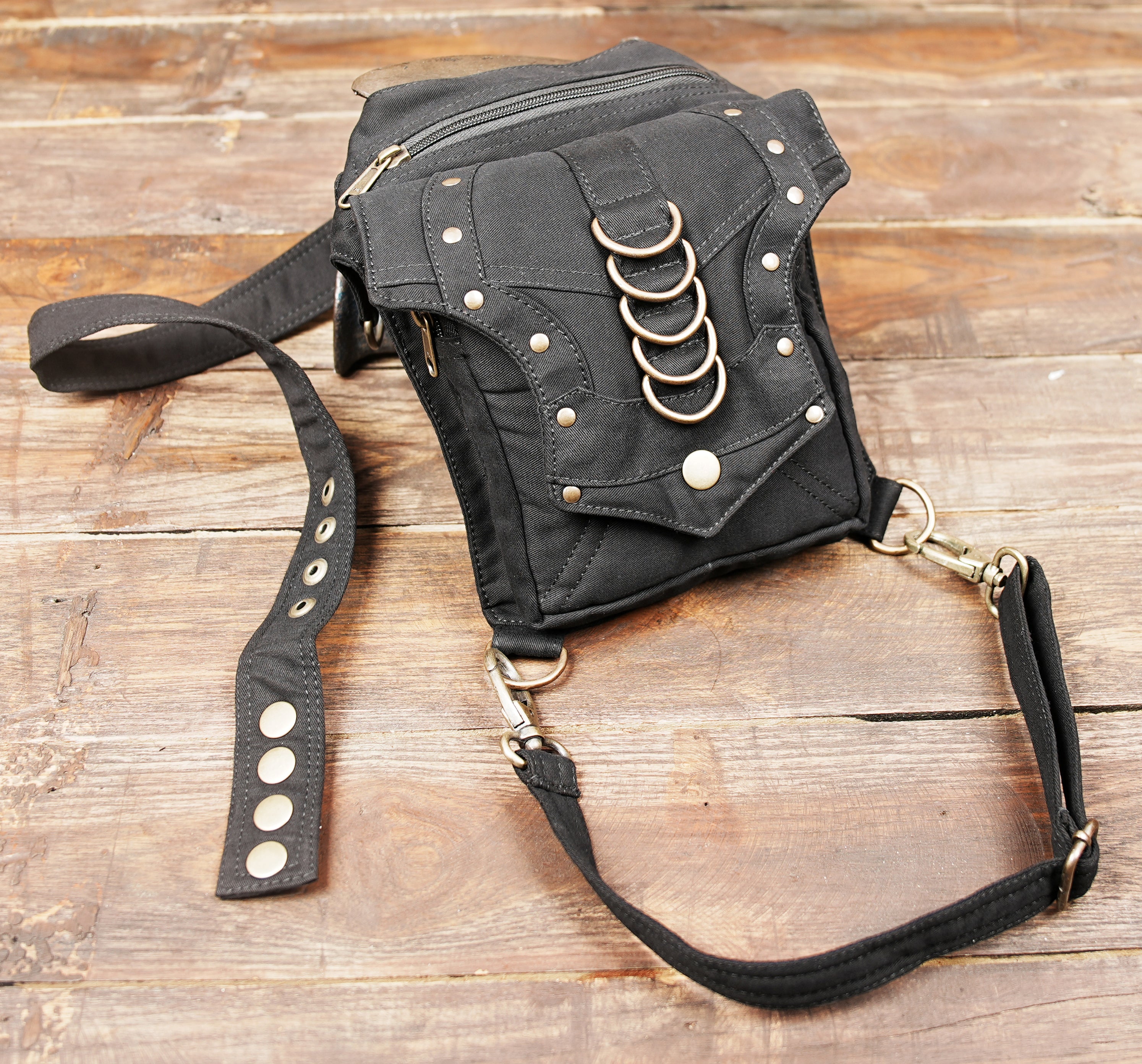 Utility drop leg fanny pack in cotton canvas for rave festivals and motorcycle trips.