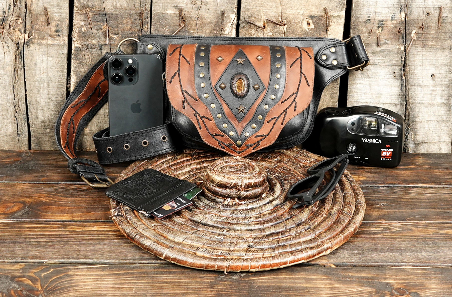 Festival-ready leather waist belt bag with gemstone center