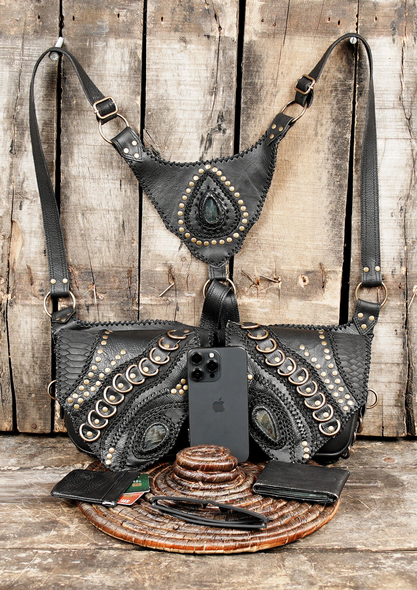 Handmade leather holster with braided and studded finish