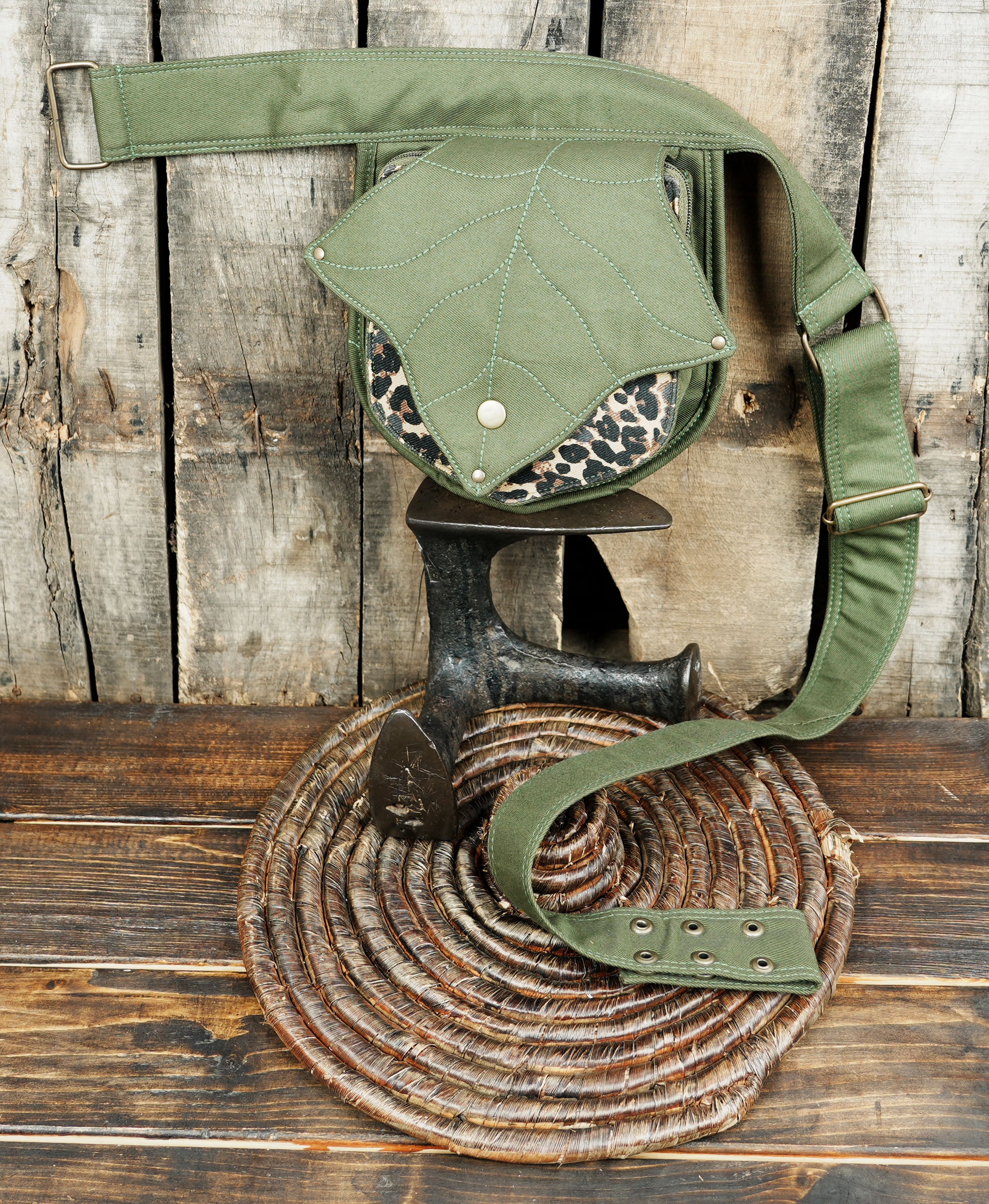 Unique olive green belt pouch with a subtle leopard print detail, perfect for alternative fashion