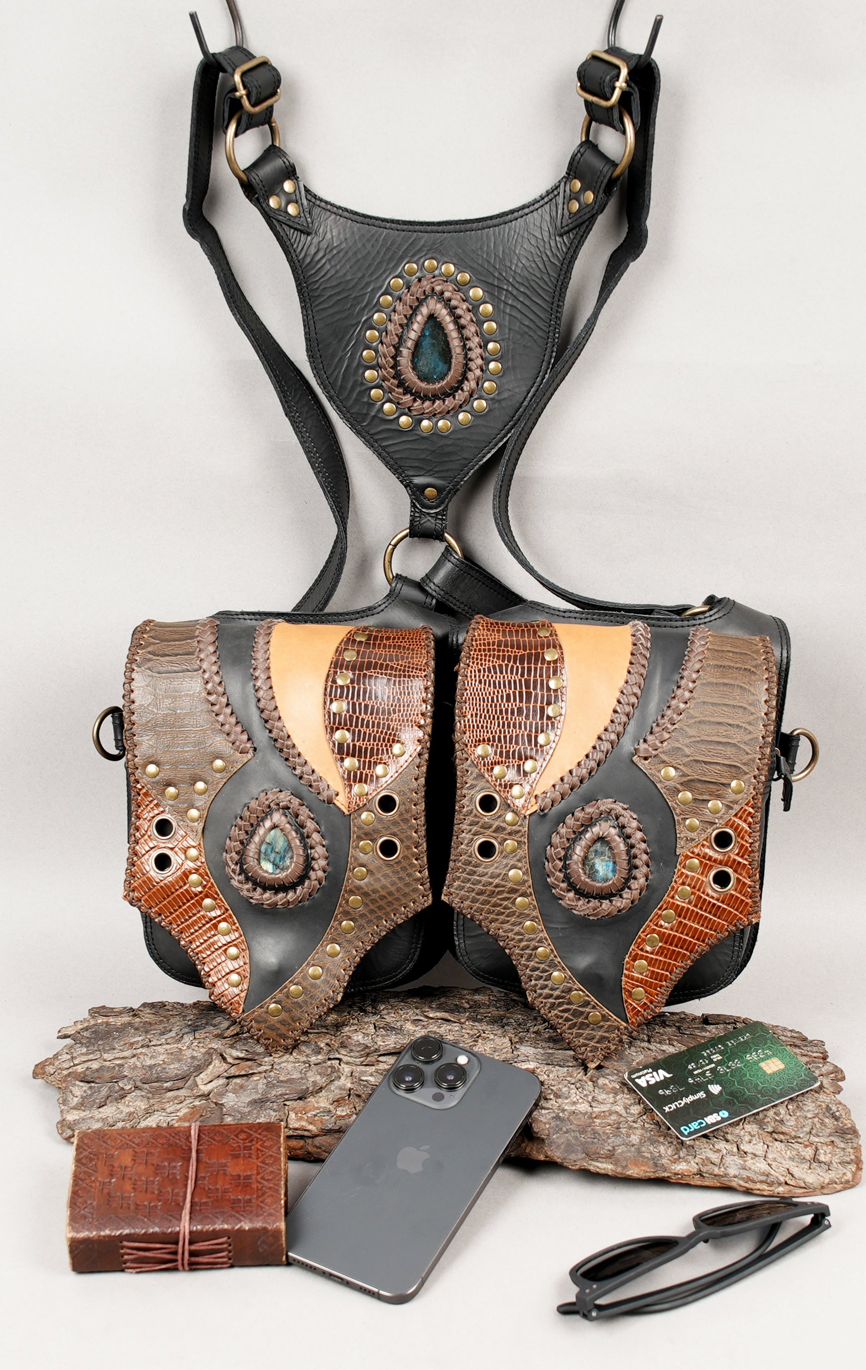 Decorative leather shoulder holster with unique textured panels