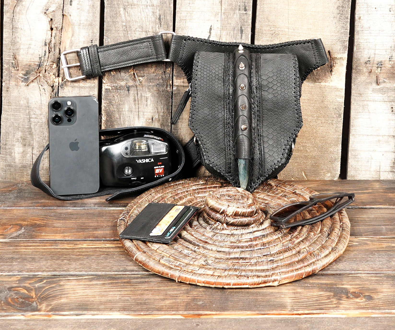 Leather waist belt with handcrafted stitching and stud accents