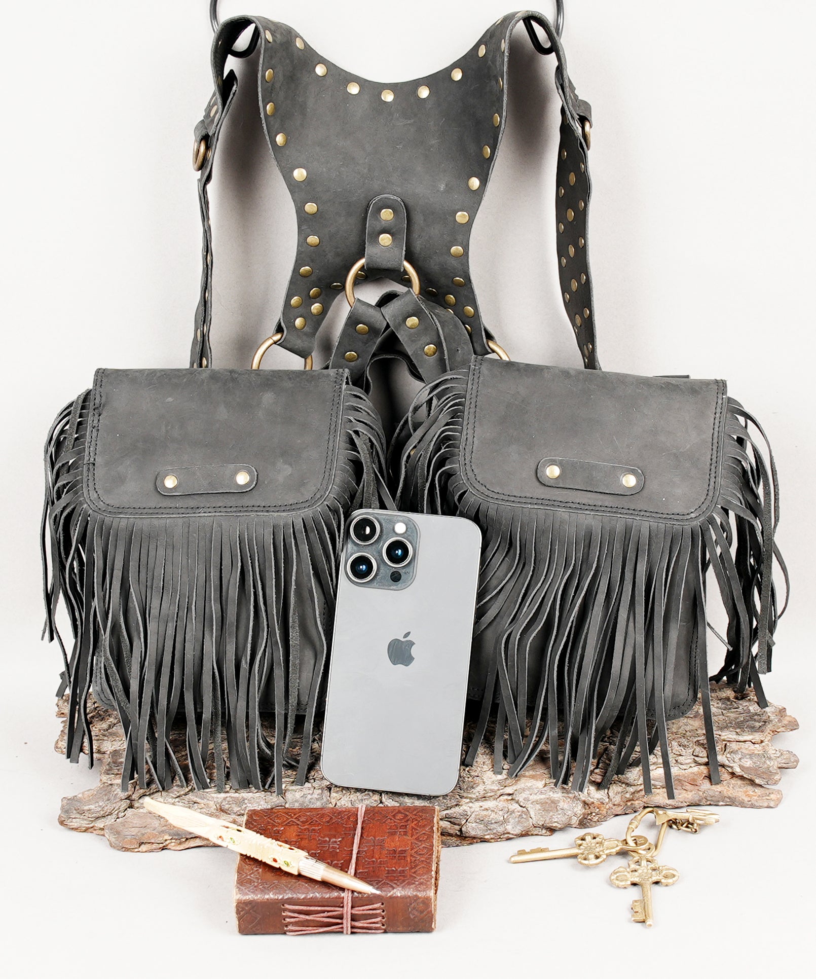 Gothic leather holster bag with fringe accents