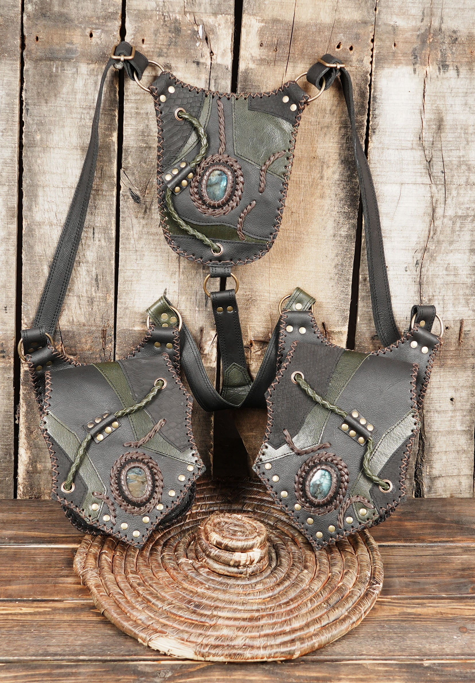 Unisex dark leather harness holster ideal for cosplay, Burning Man, and gothic wear.