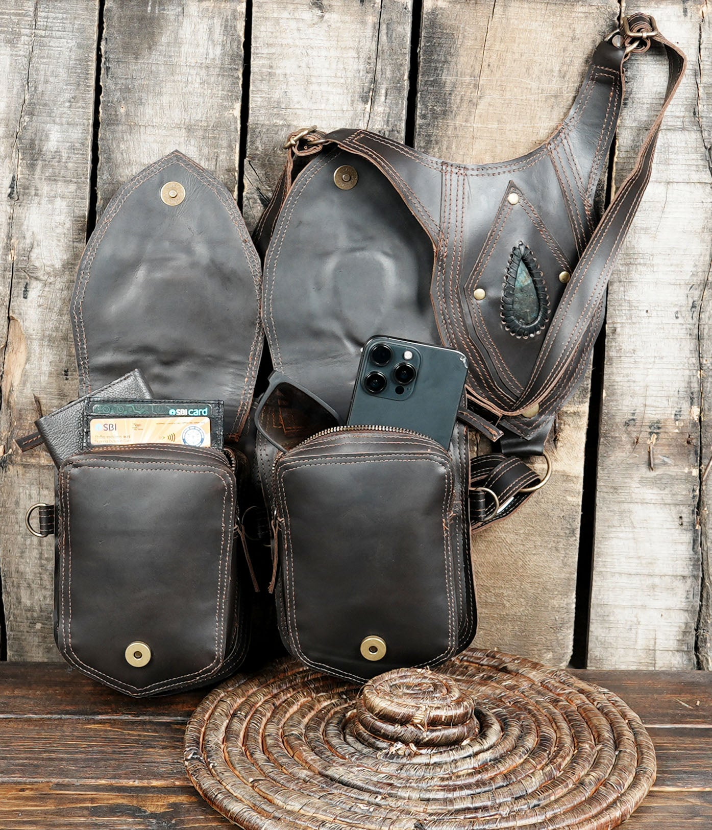 Close-up of gemstone inlay on leather holster bag