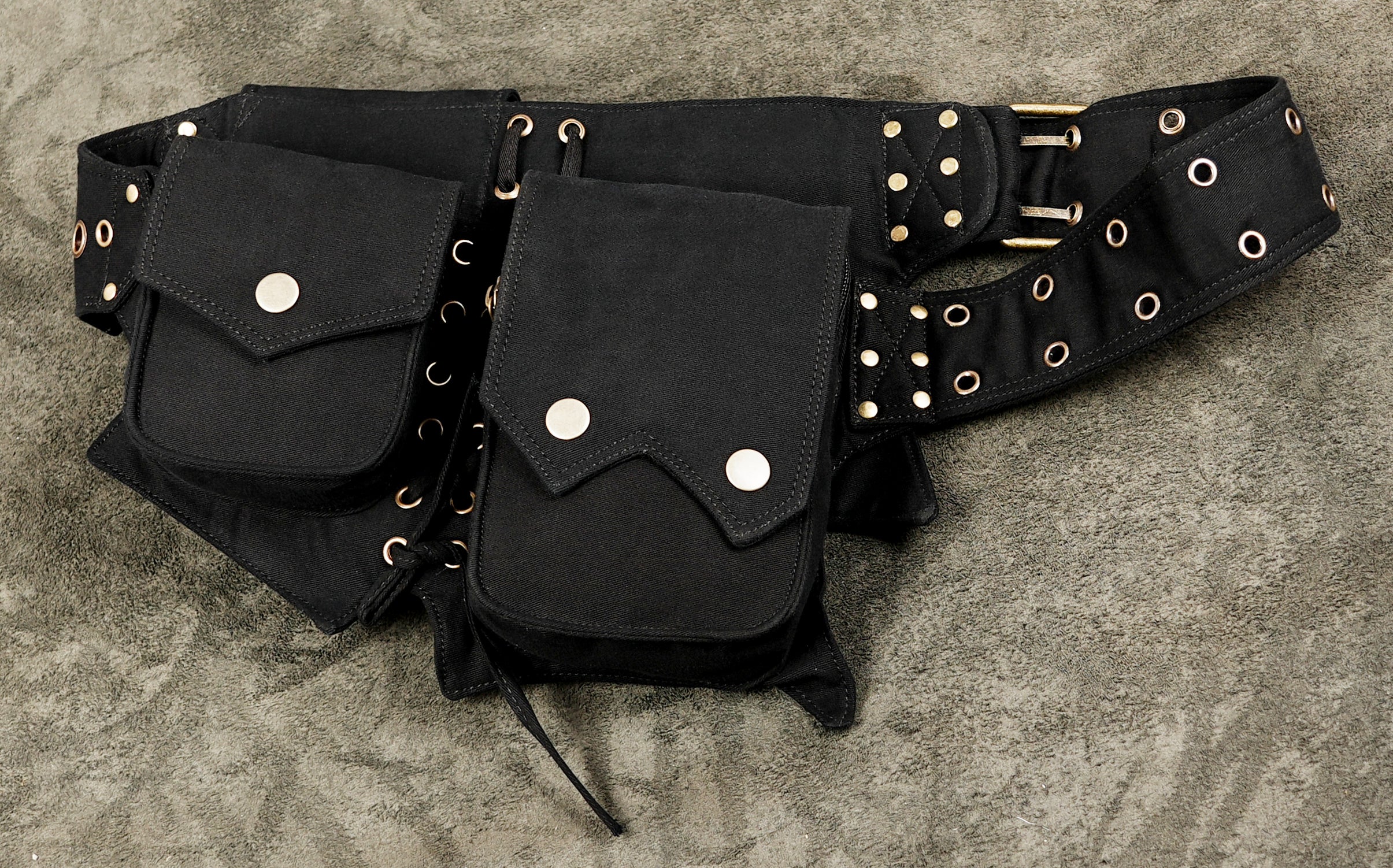 Black rave utility belt with multi-pocket storage and adjustable waist strap