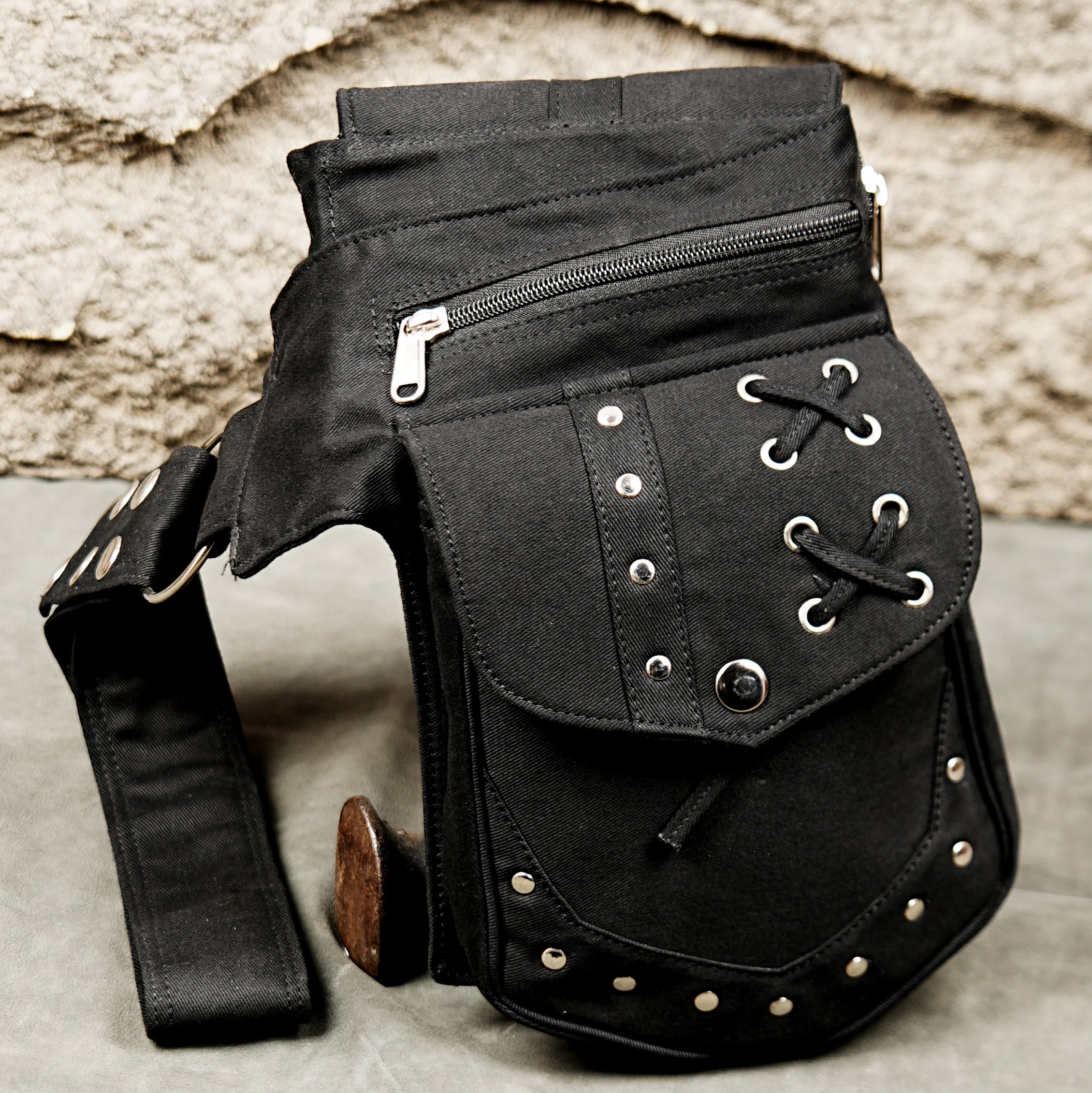 Black cotton steampunk utility belt bag with metal studs eyelets and practical storage pockets.