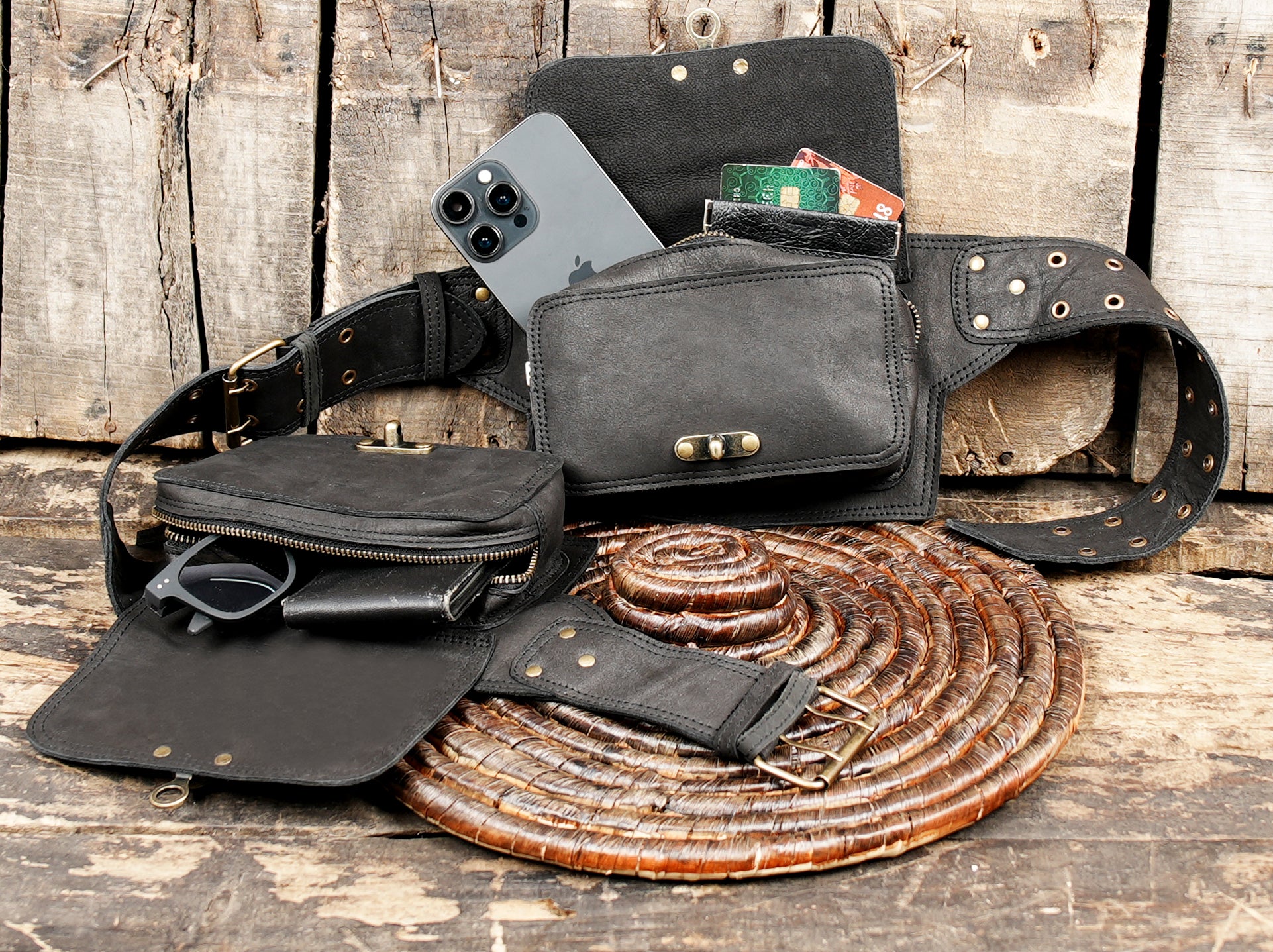 Black leather belt bag with twin buckle-closure pockets